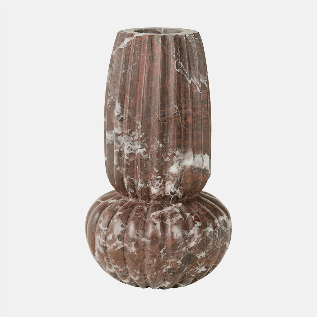 a marble vase sitting on top of a table