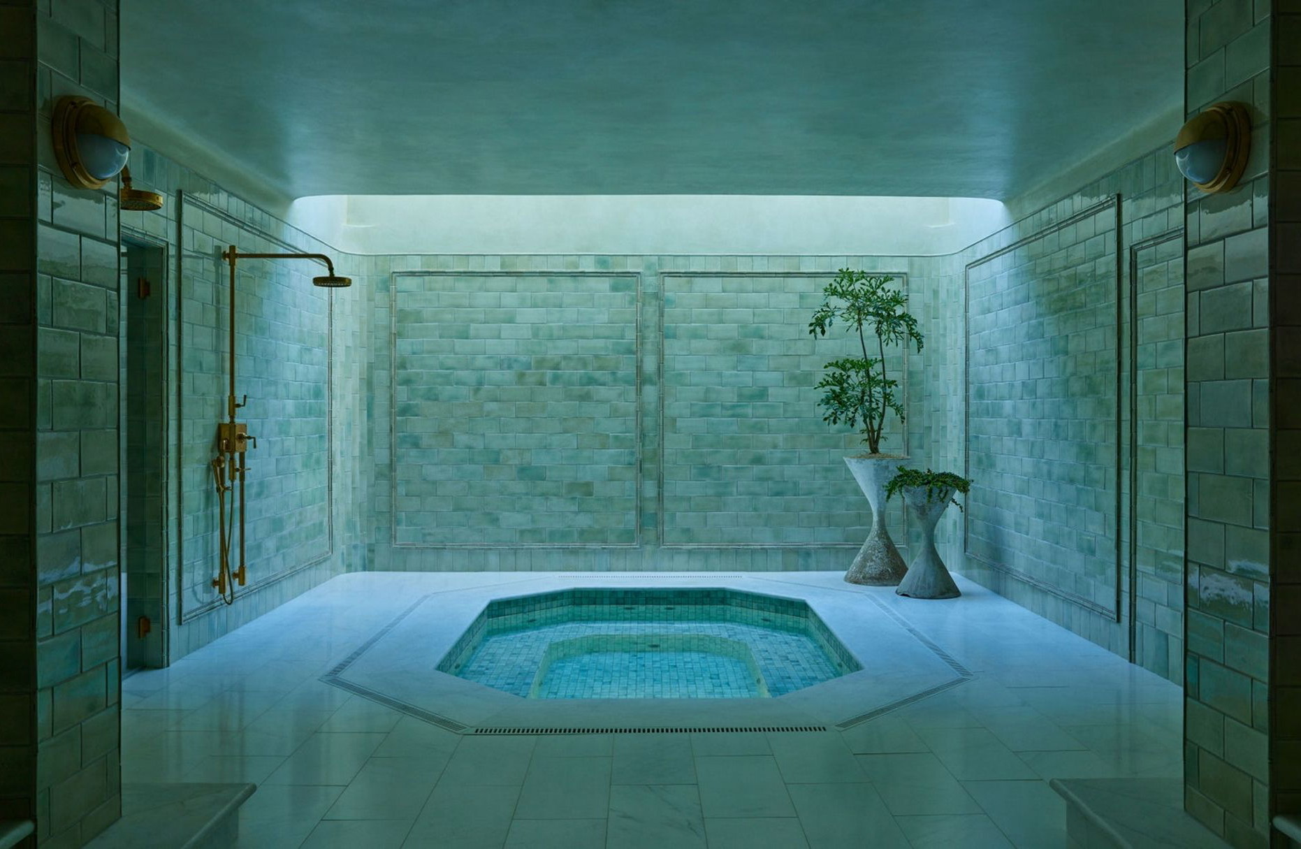 a bathroom with a jacuzzi tub in the middle of it