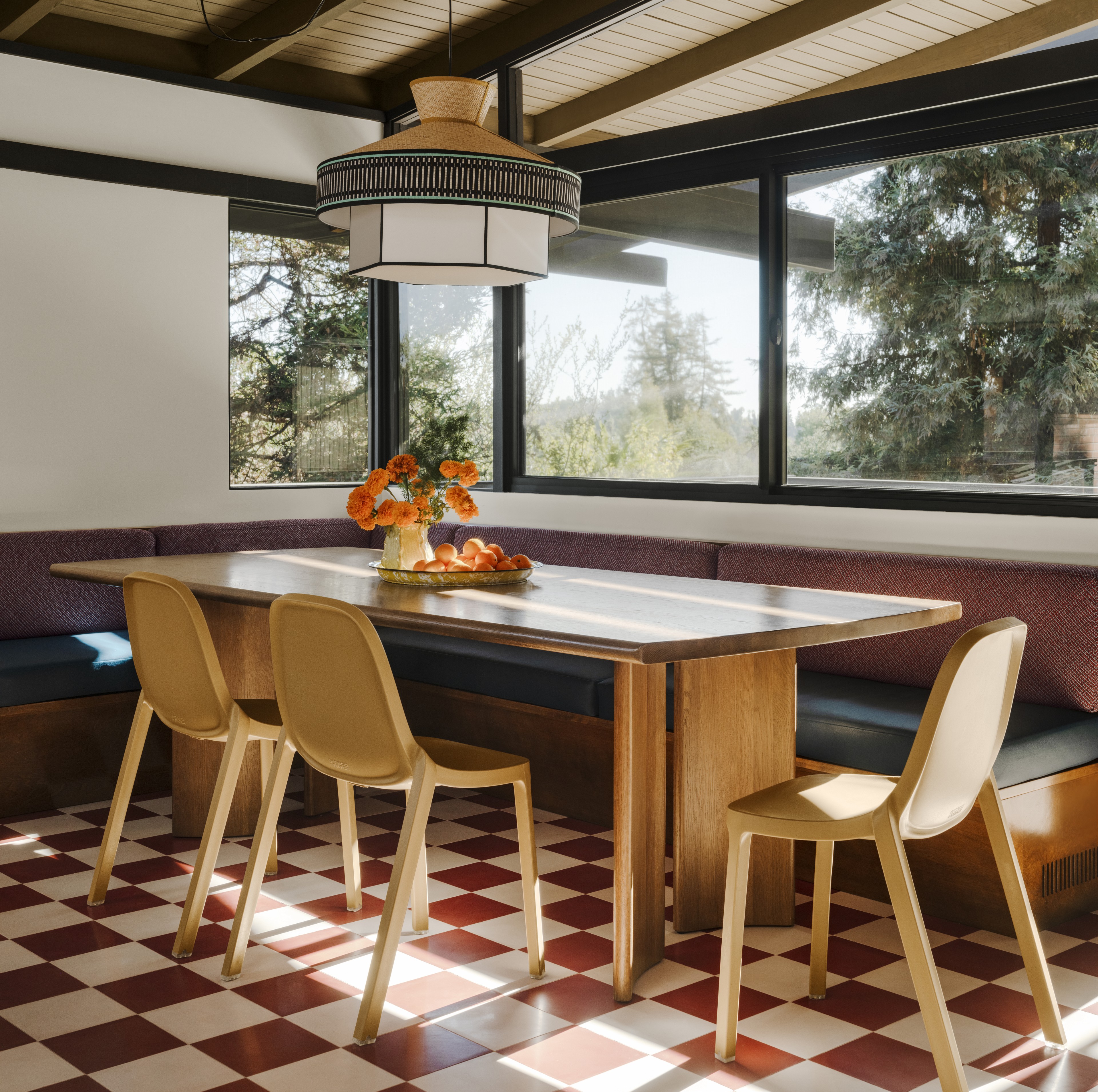a dining room with a checkered floor and a table