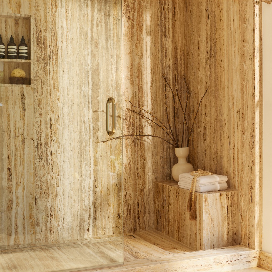 a bathroom with a glass shower door and a wooden wall