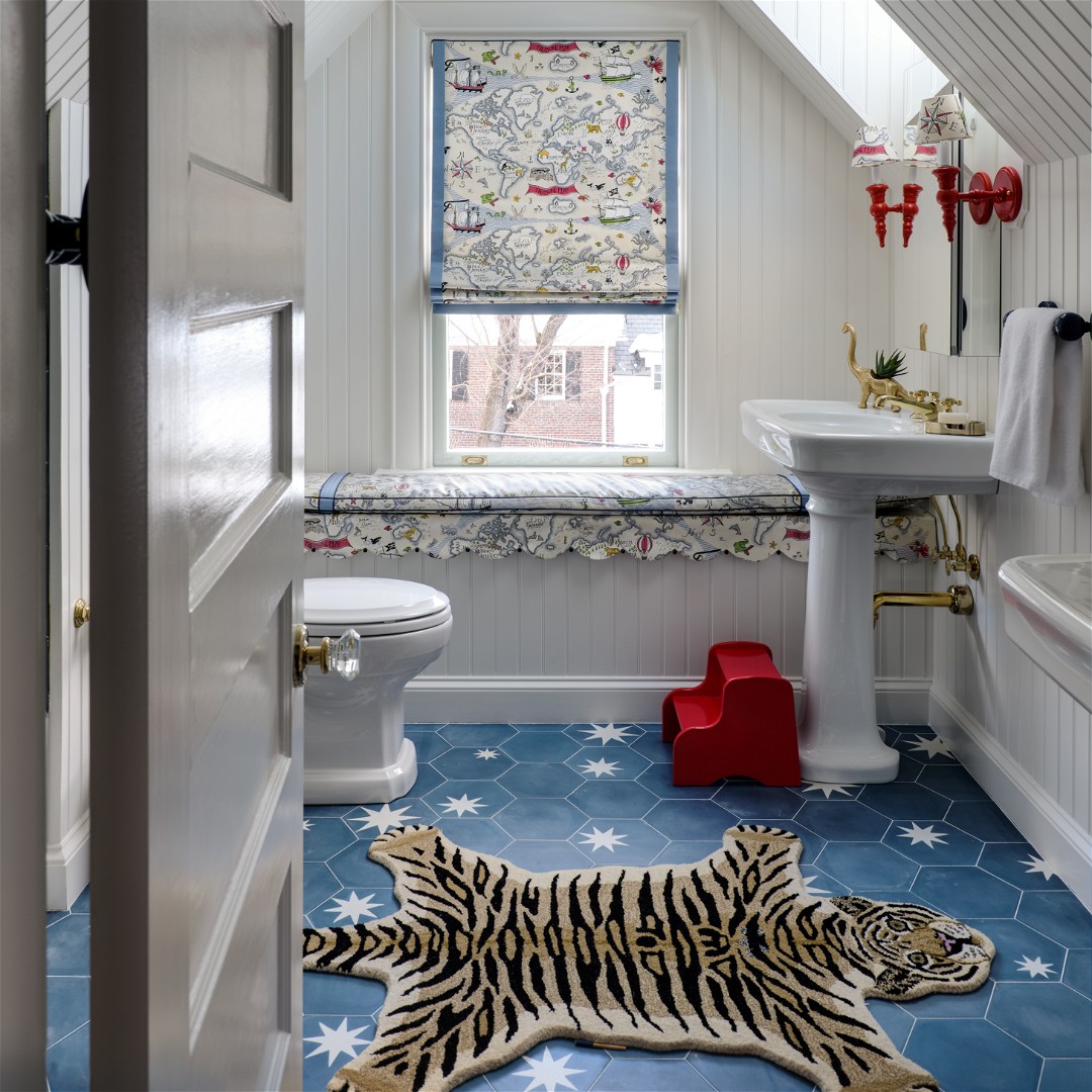 a bathroom with a tiger rug on the floor