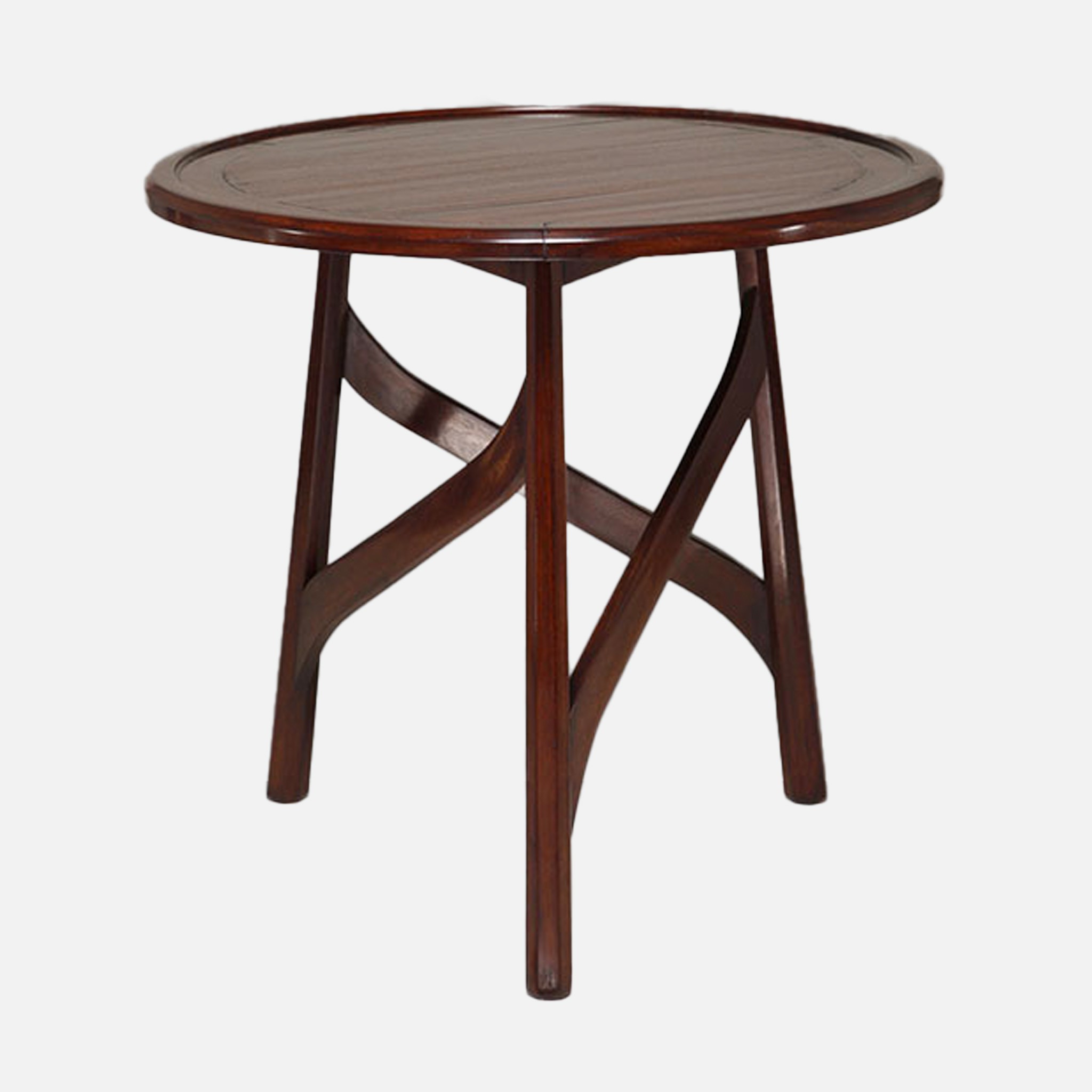a round wooden table with a cross leg