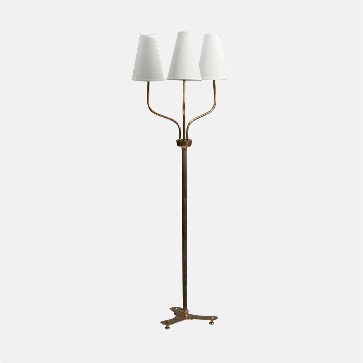 a floor lamp with three lamps on it