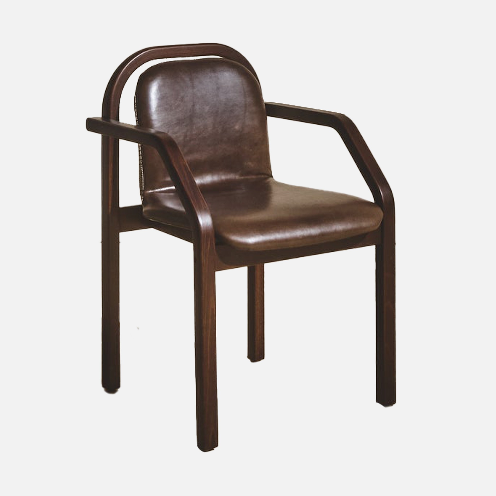 a wooden chair with a brown leather seat