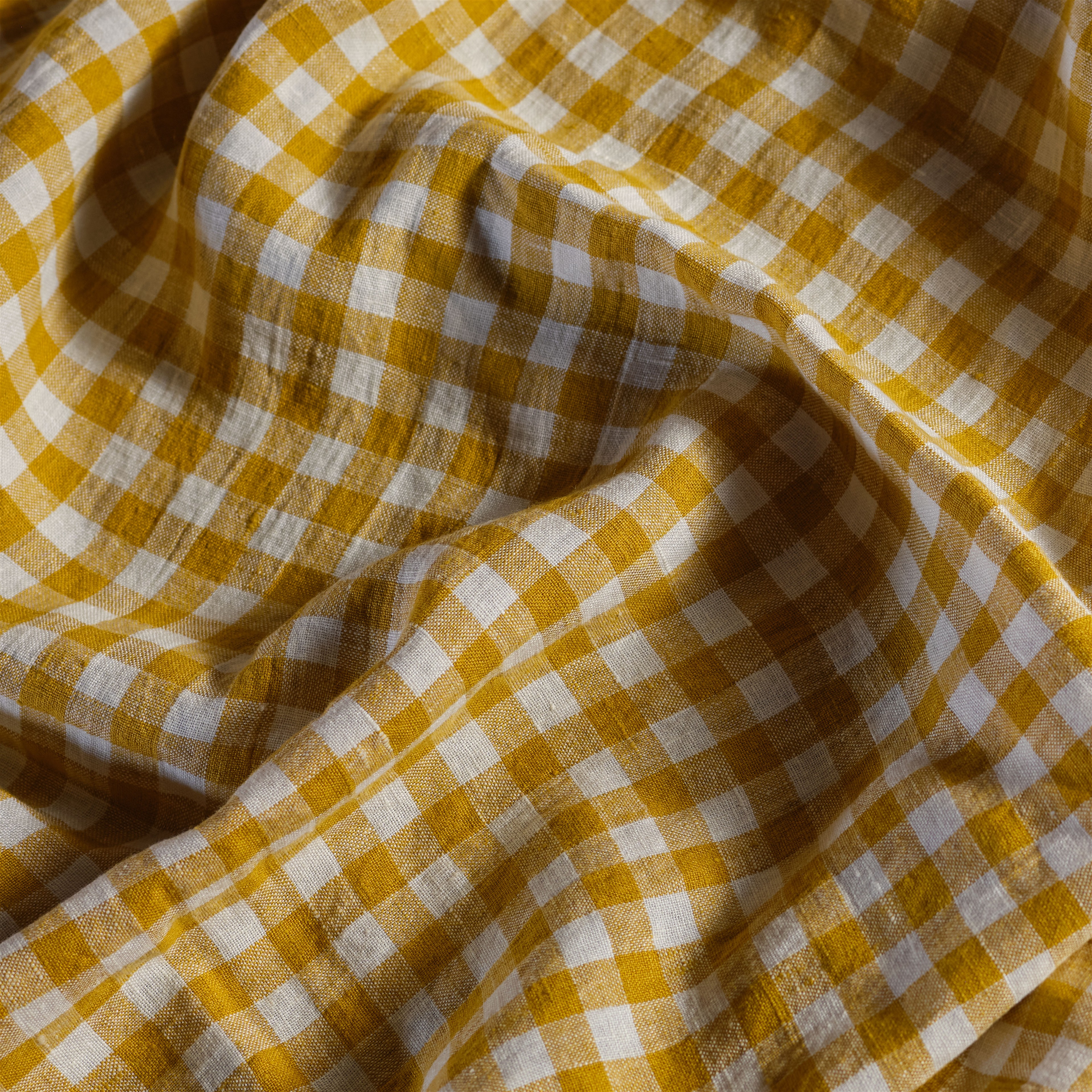 a yellow and white checkered fabric