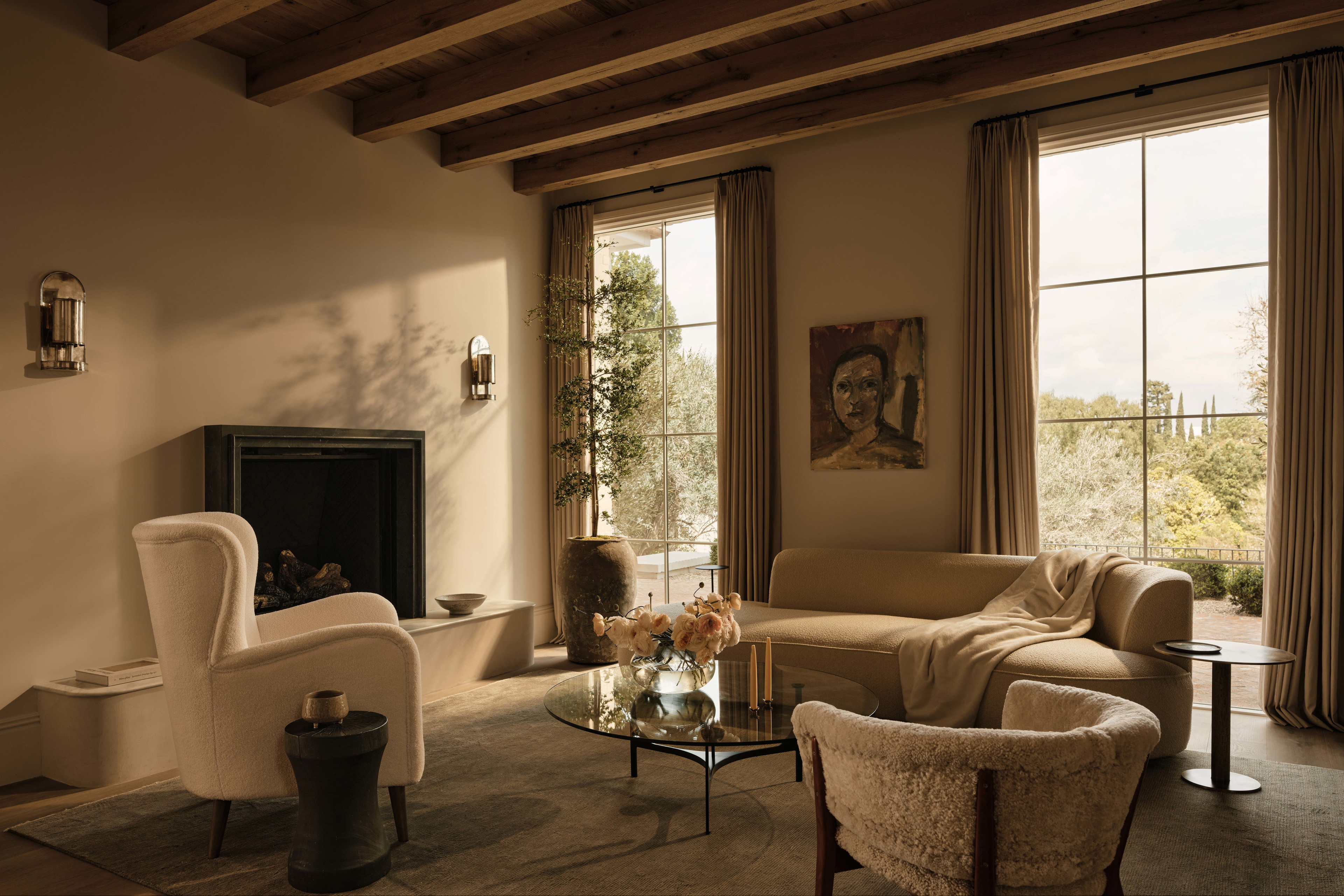 a living room filled with furniture and a fire place