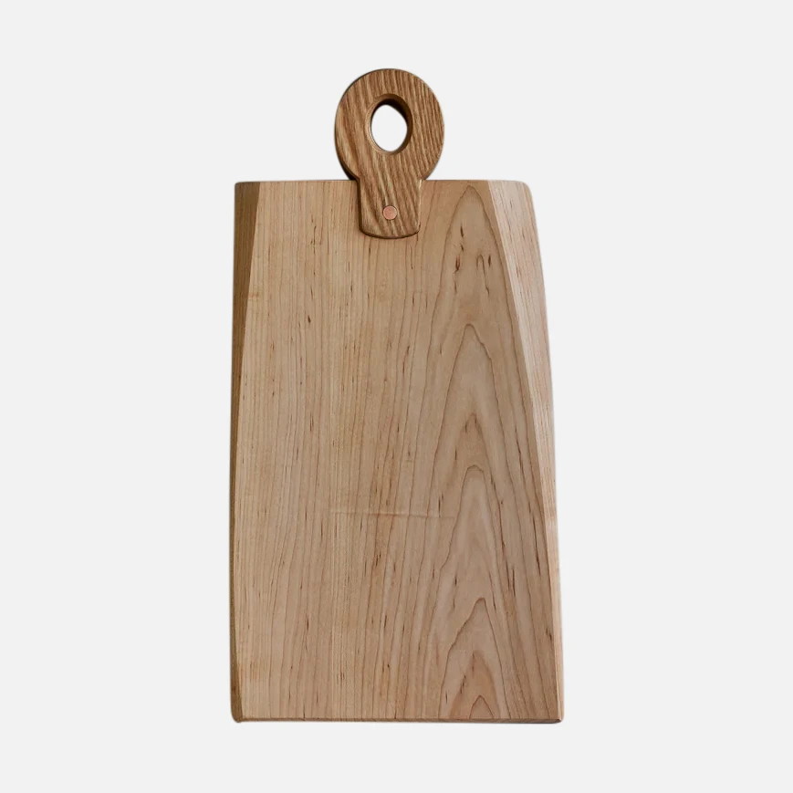 a wooden cutting board with a wooden handle