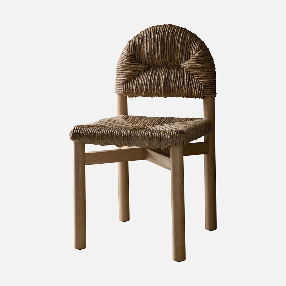 a wooden chair with a woven seat