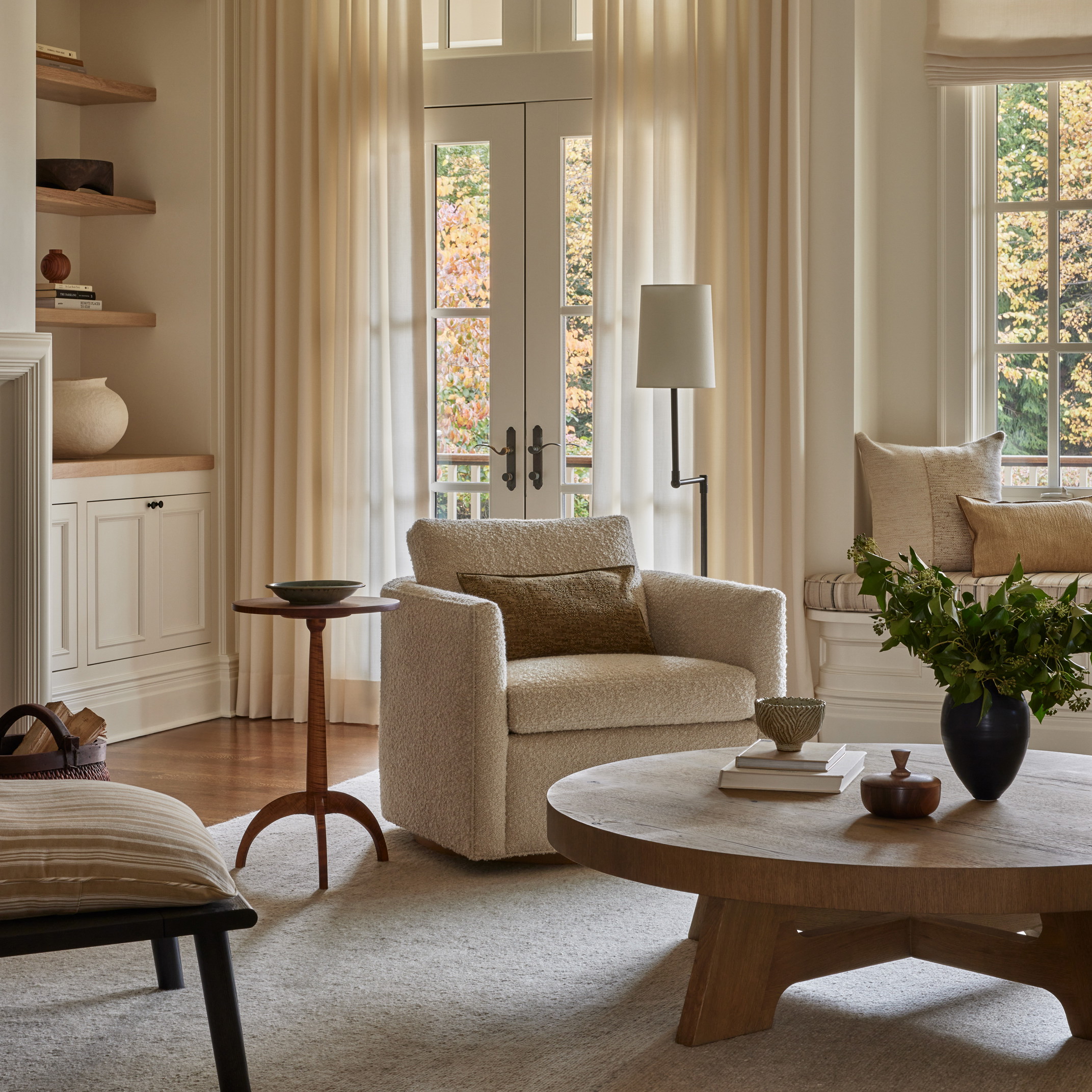 a living room filled with furniture and a fire place