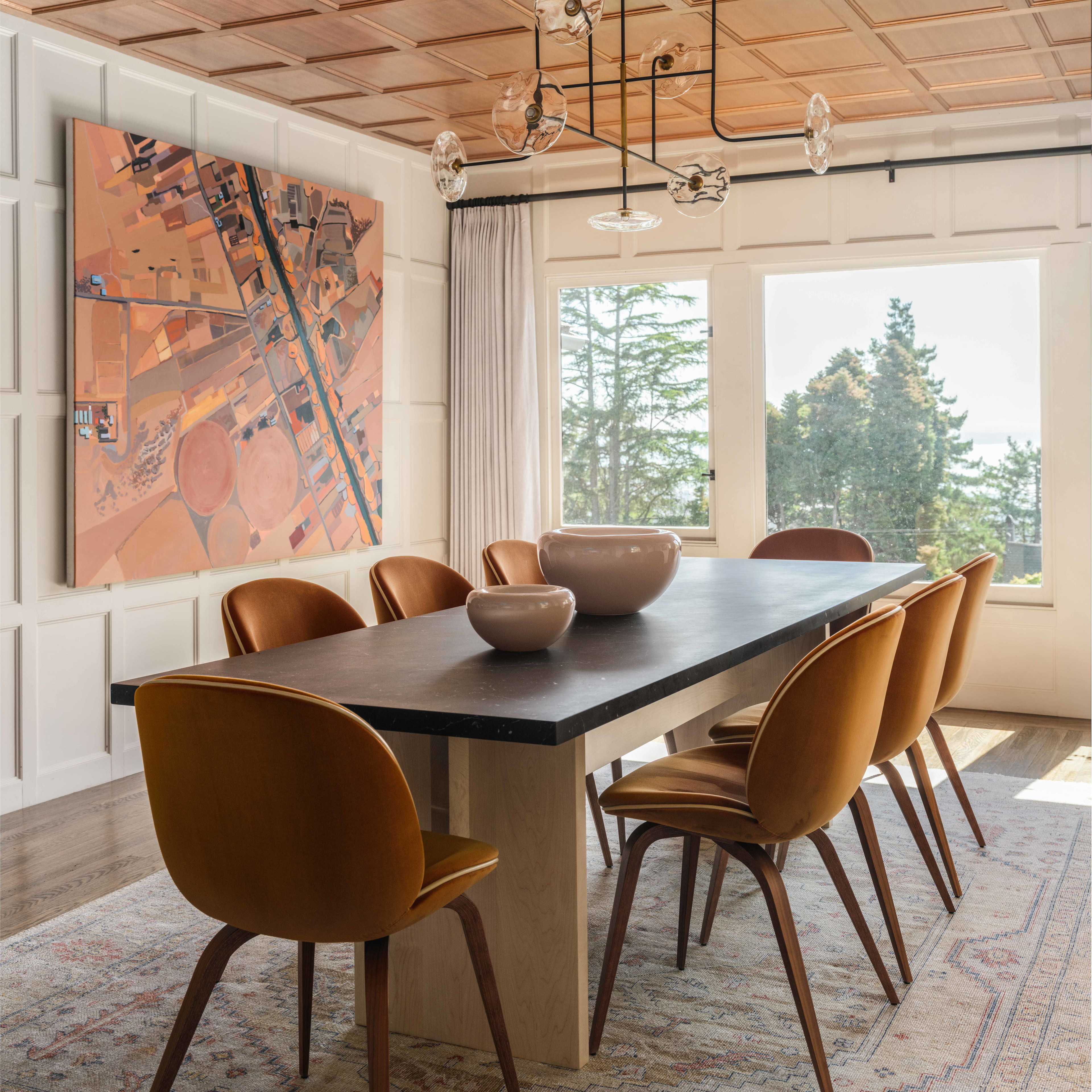 a dining room table with a bowl on top of it