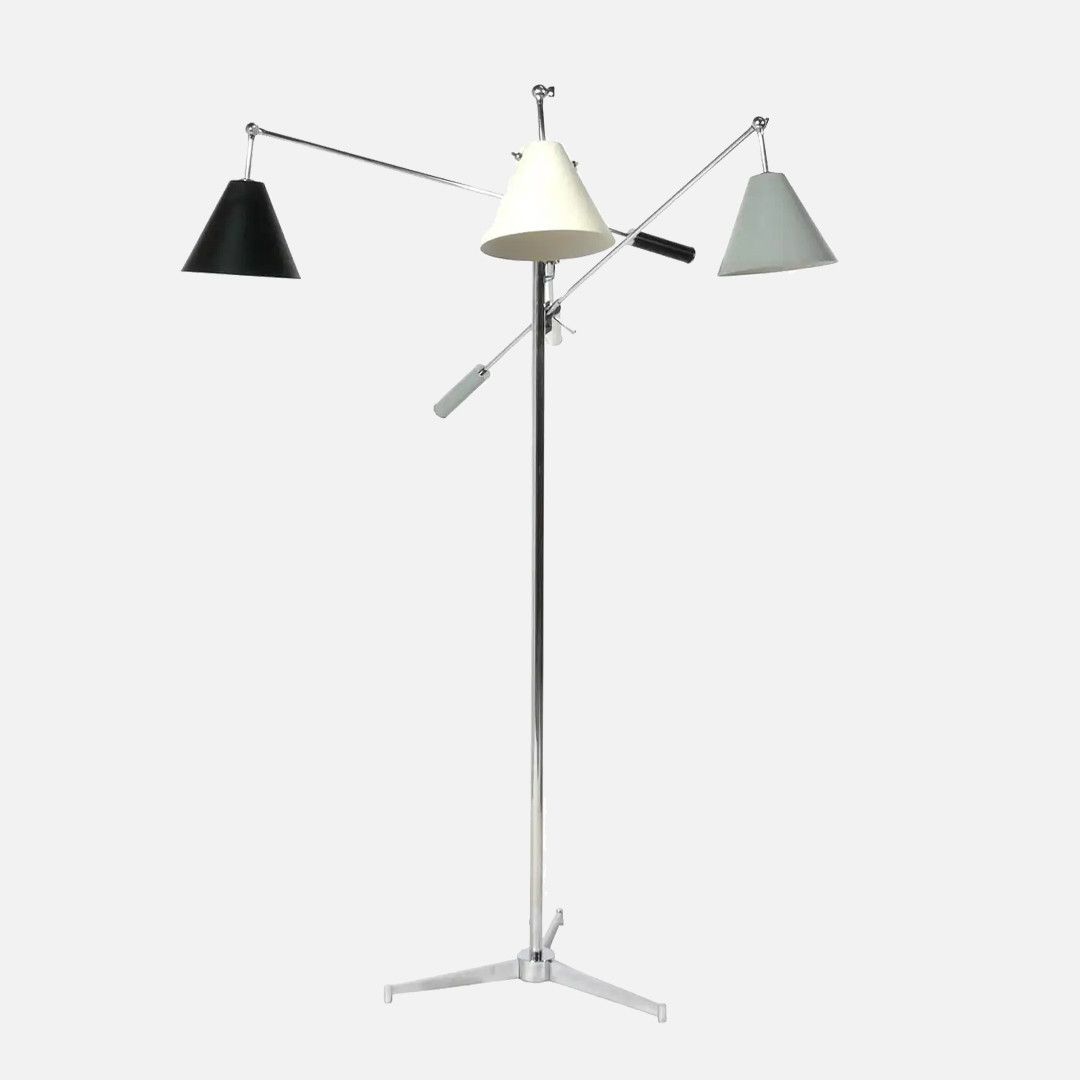 a three light floor lamp on a white background