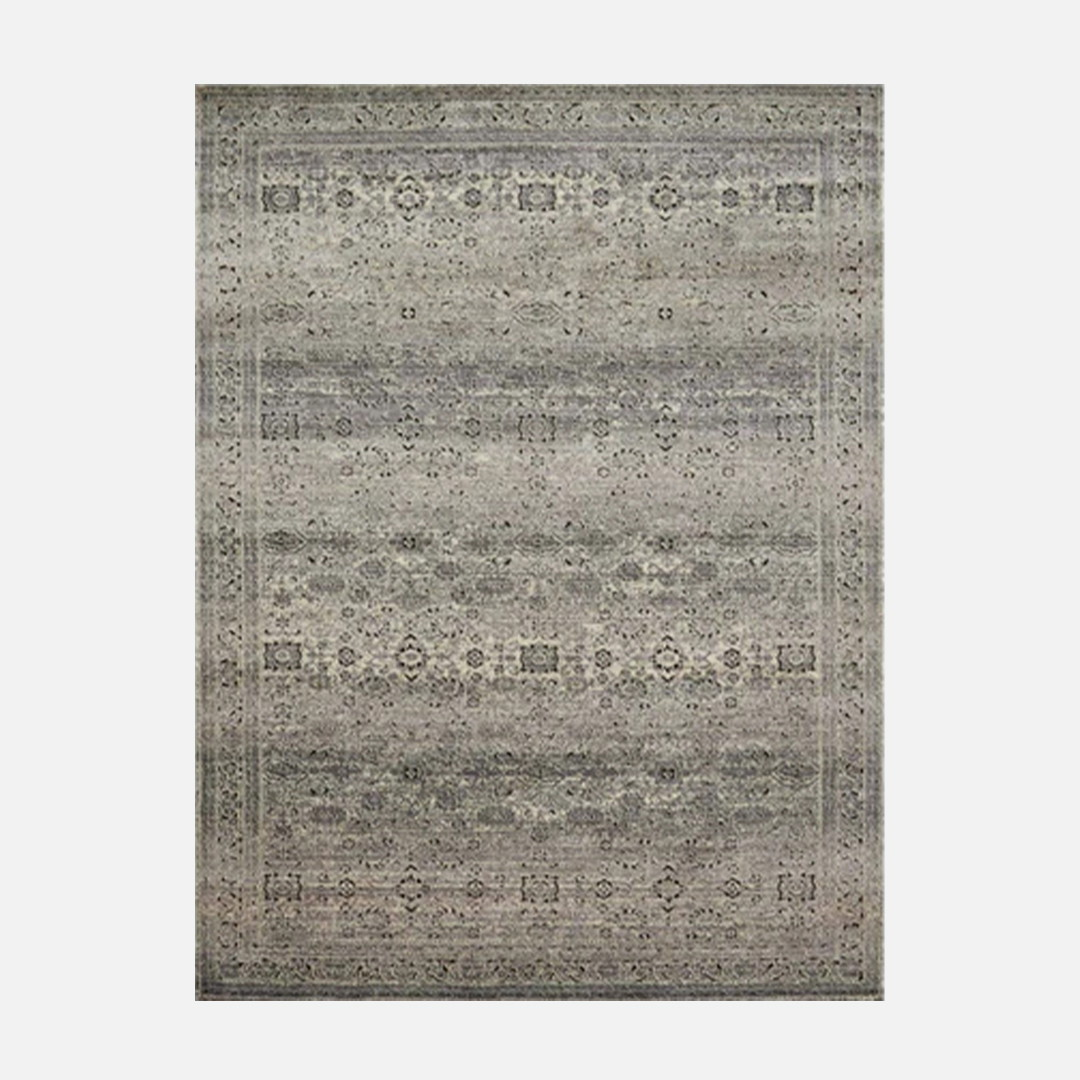 a gray rug with a pattern on it