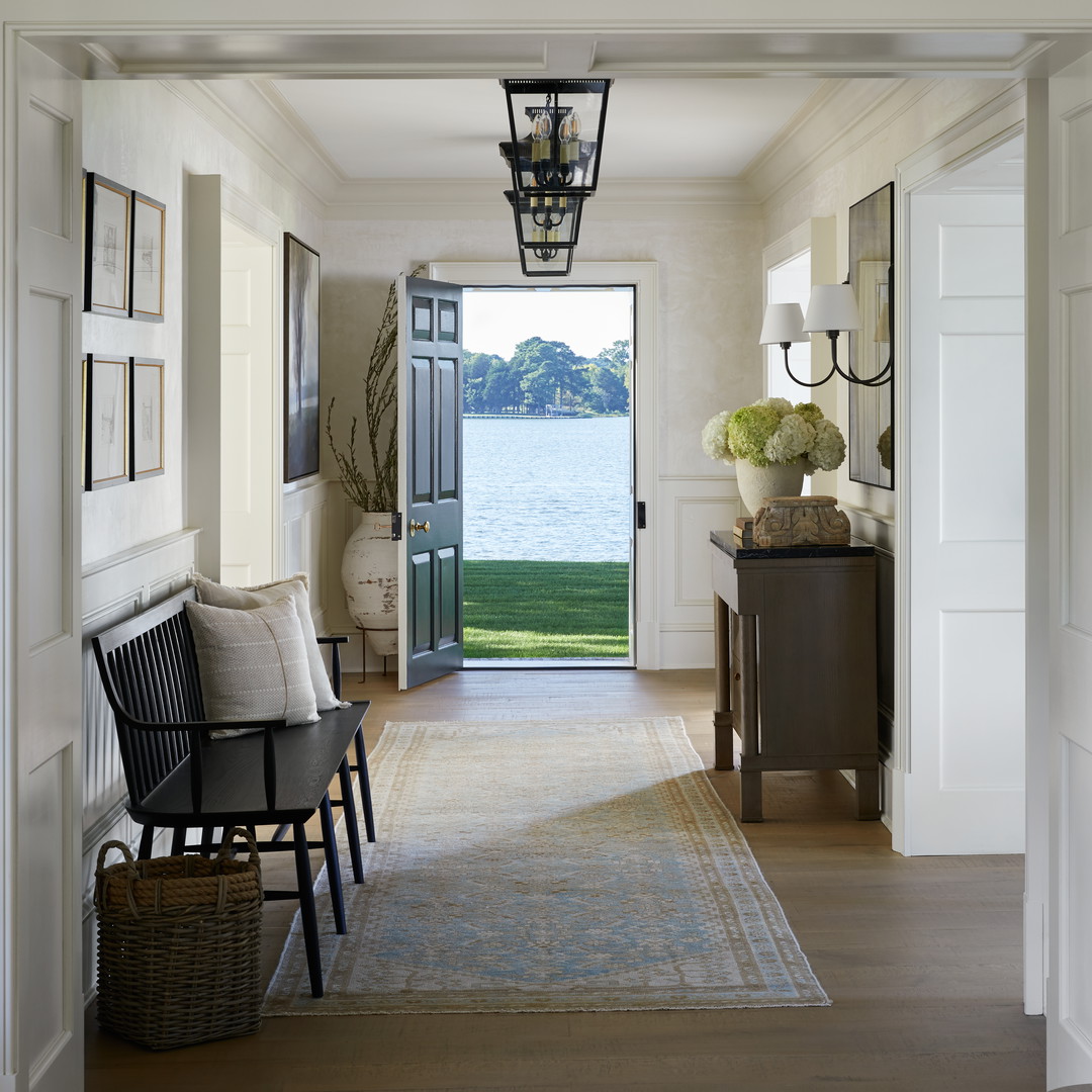 a view of a hallway leading to a lake