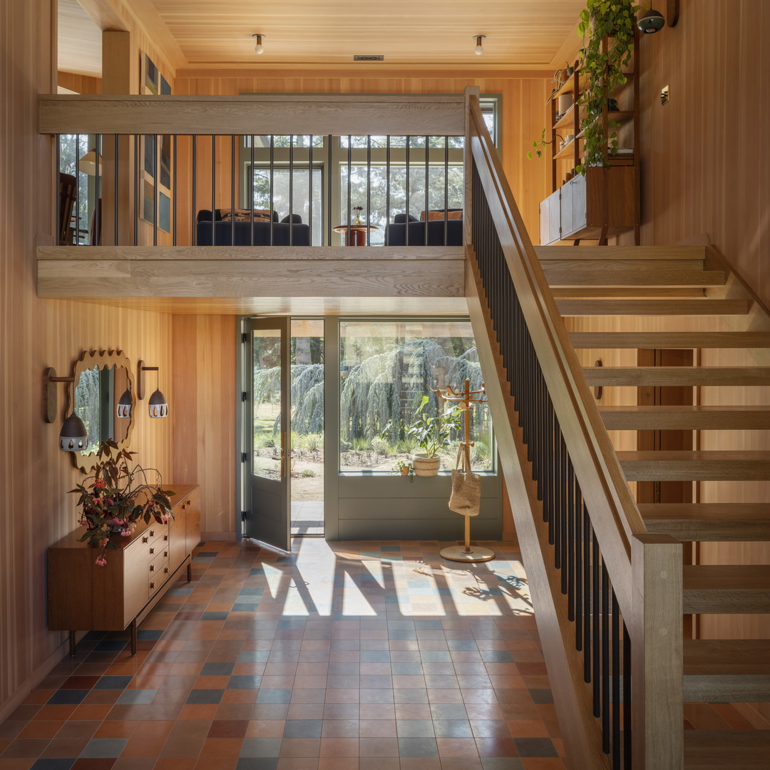 a staircase leading to a second story of a house