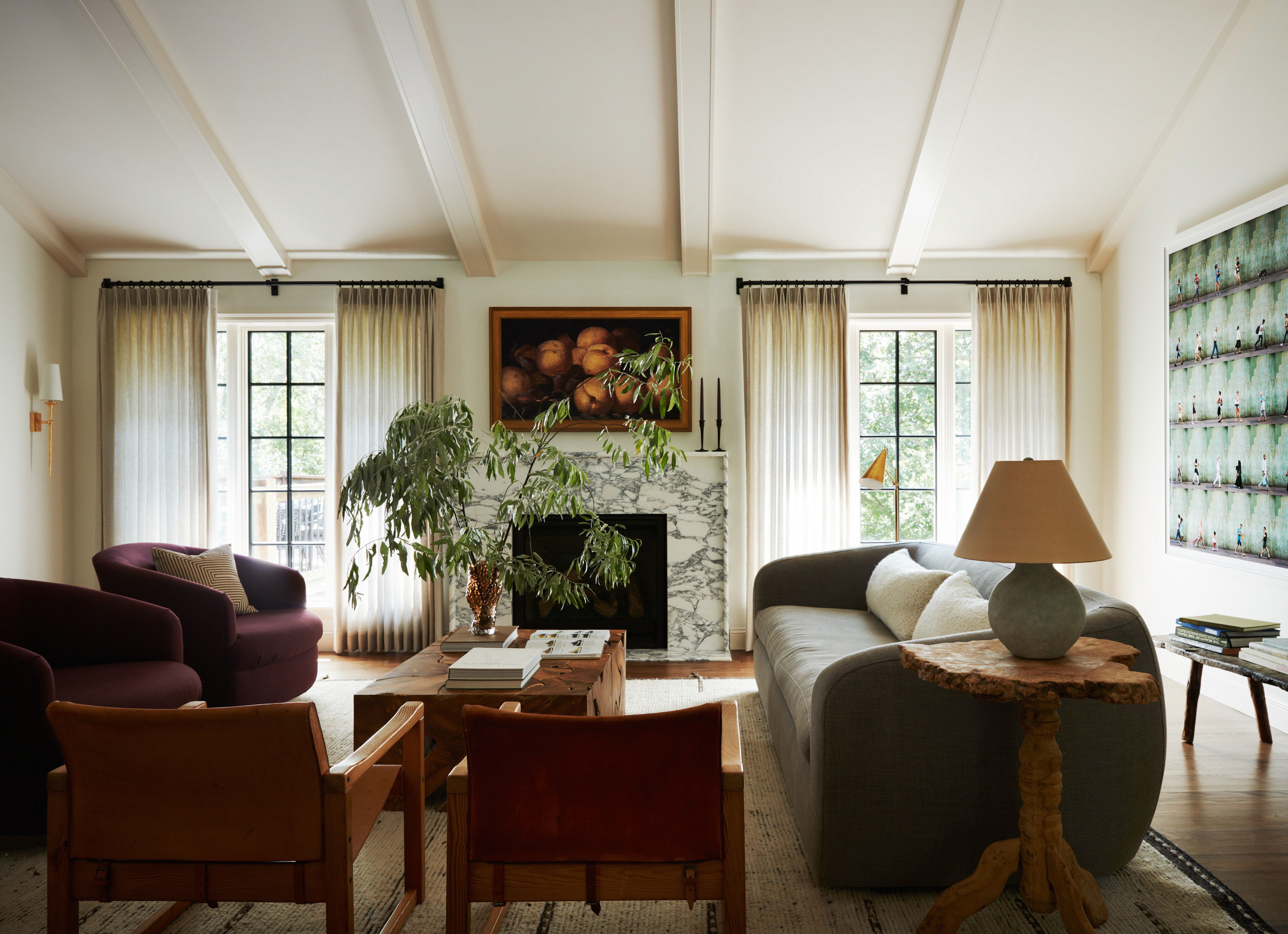 a living room filled with furniture and a fire place