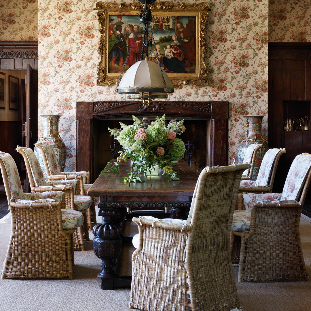 a dining room with a table and chairs