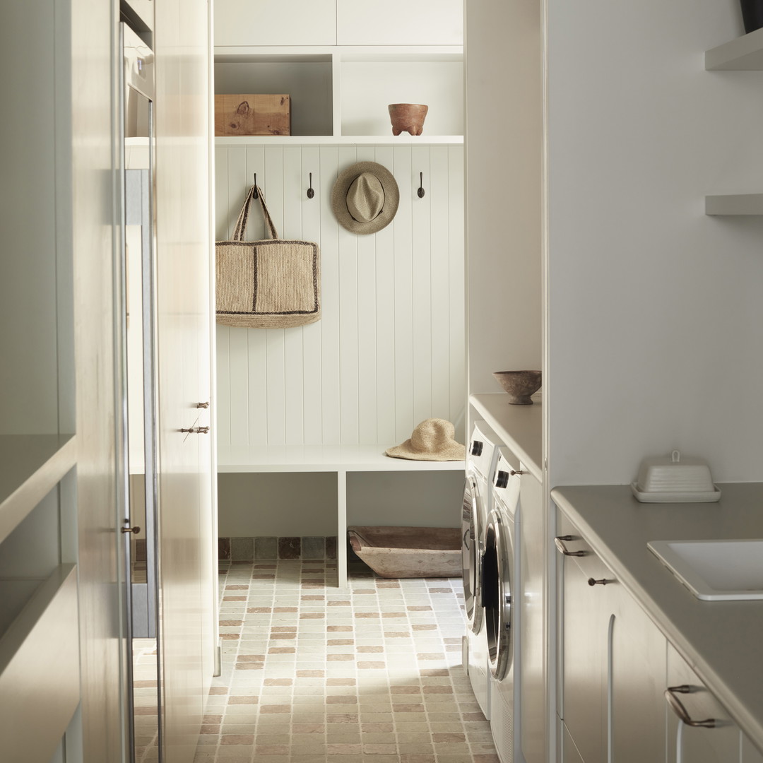 a laundry room with a washer and dryer