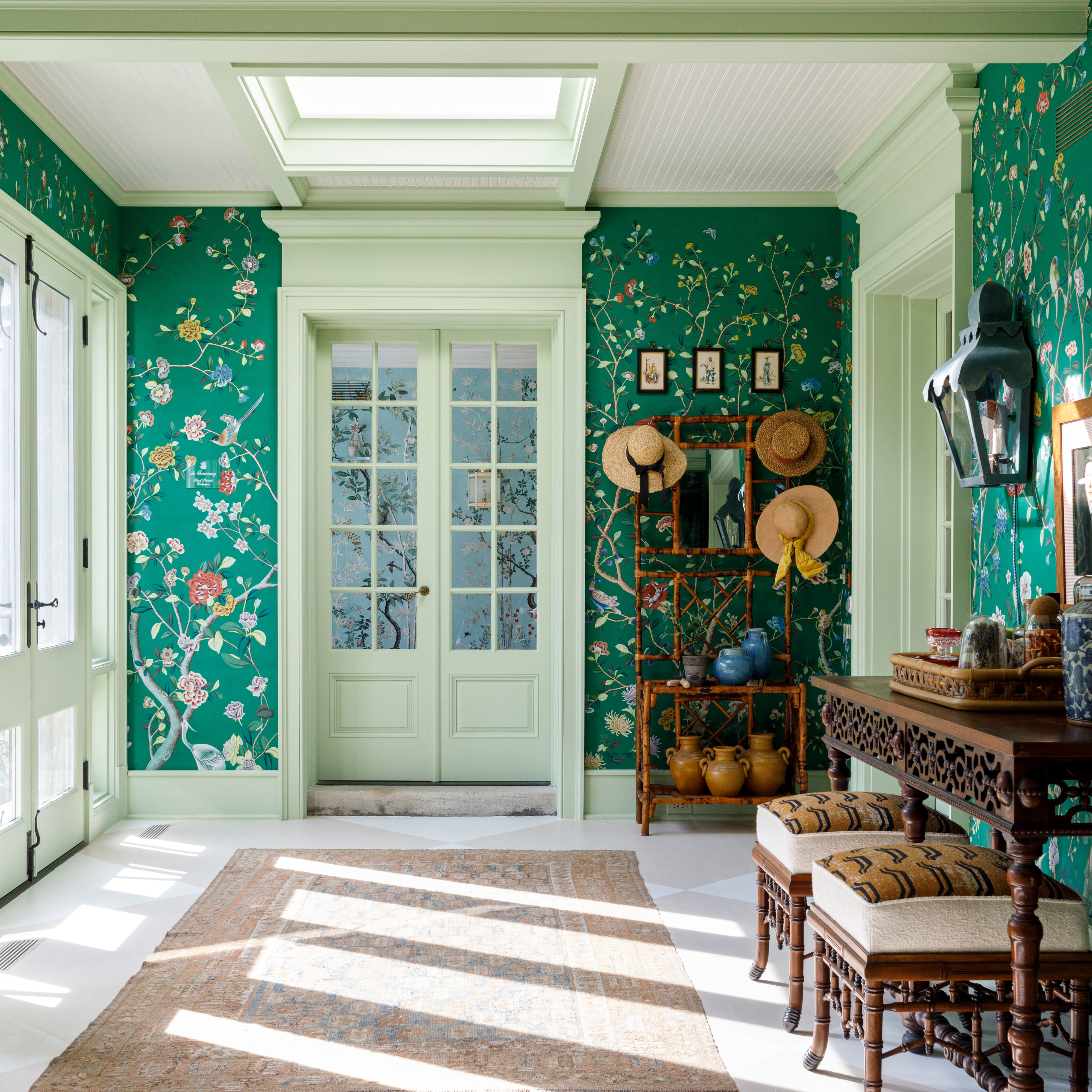 a room with green walls and a white ceiling