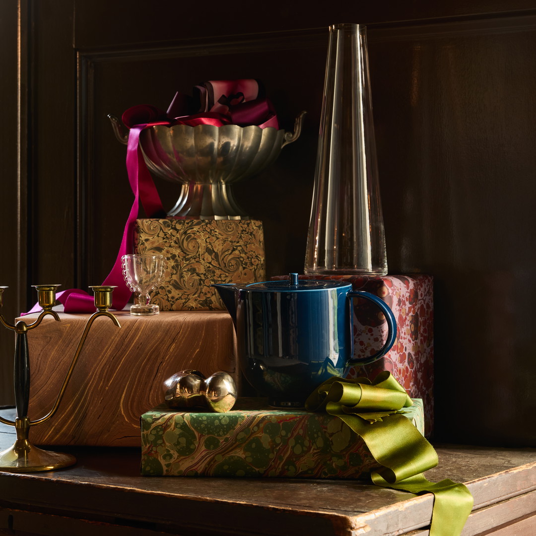 a wooden table topped with lots of different types of items