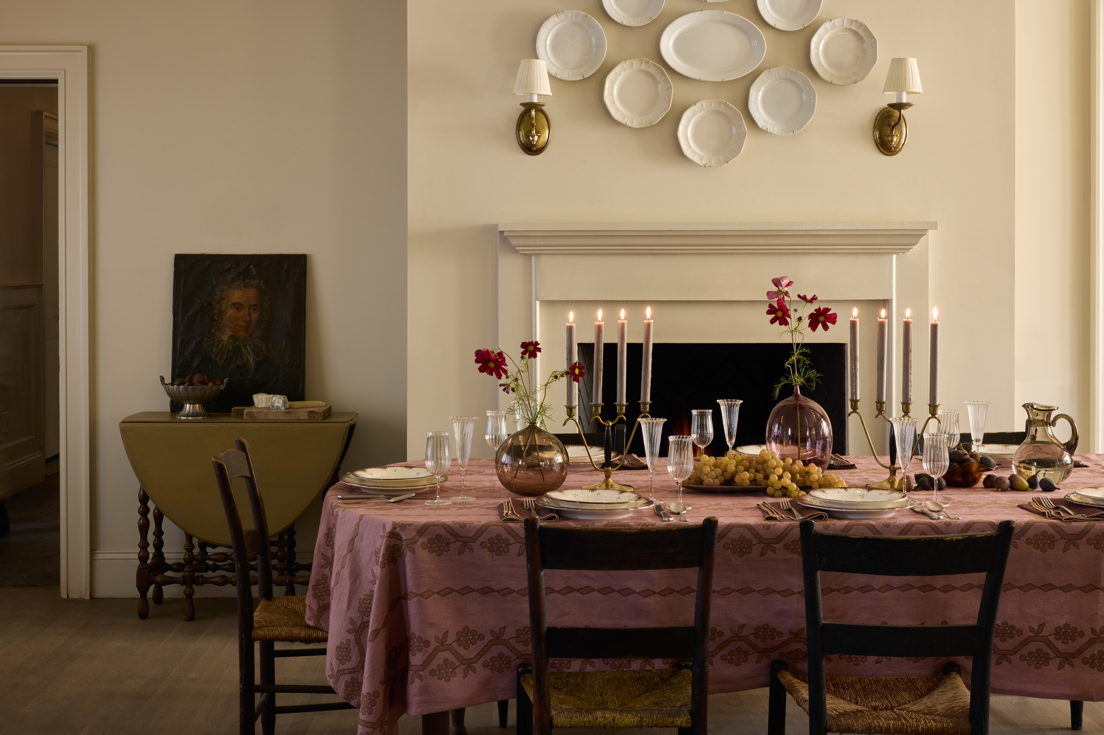 a dining room table with plates on it