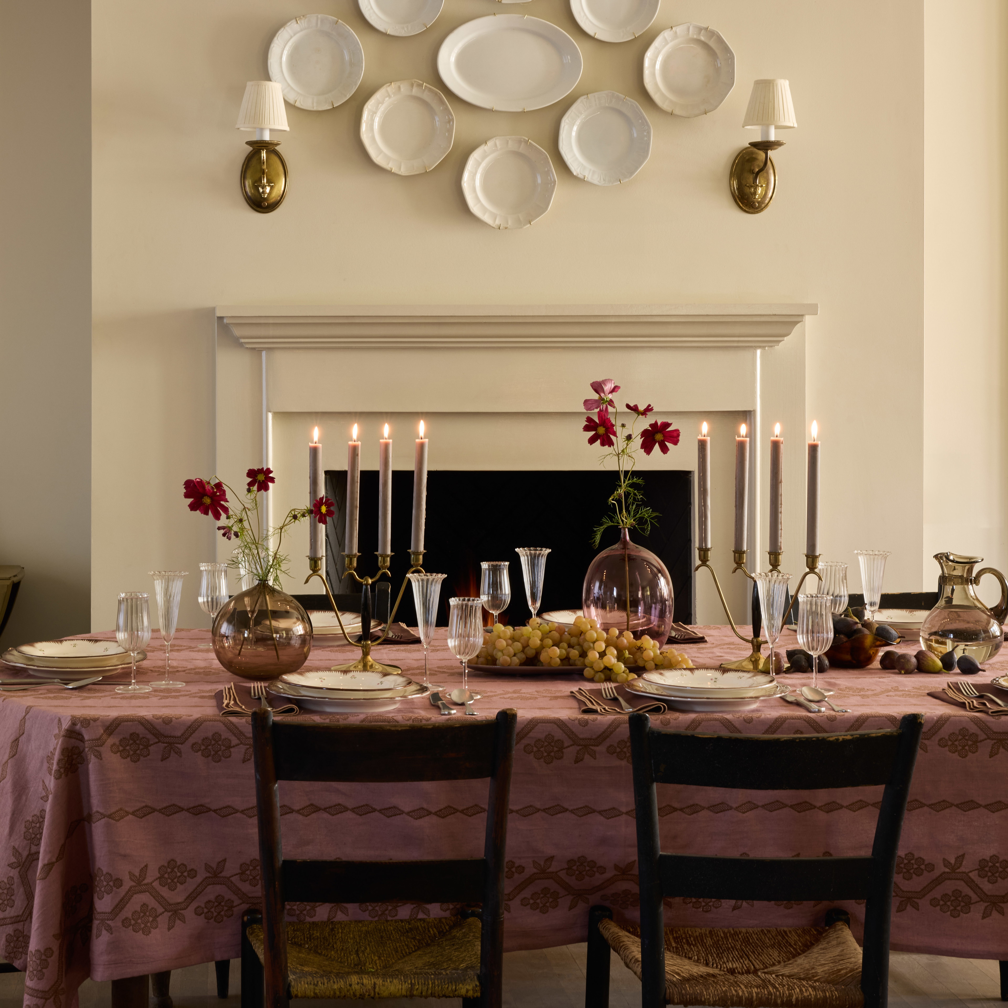 a dining room table with plates on it