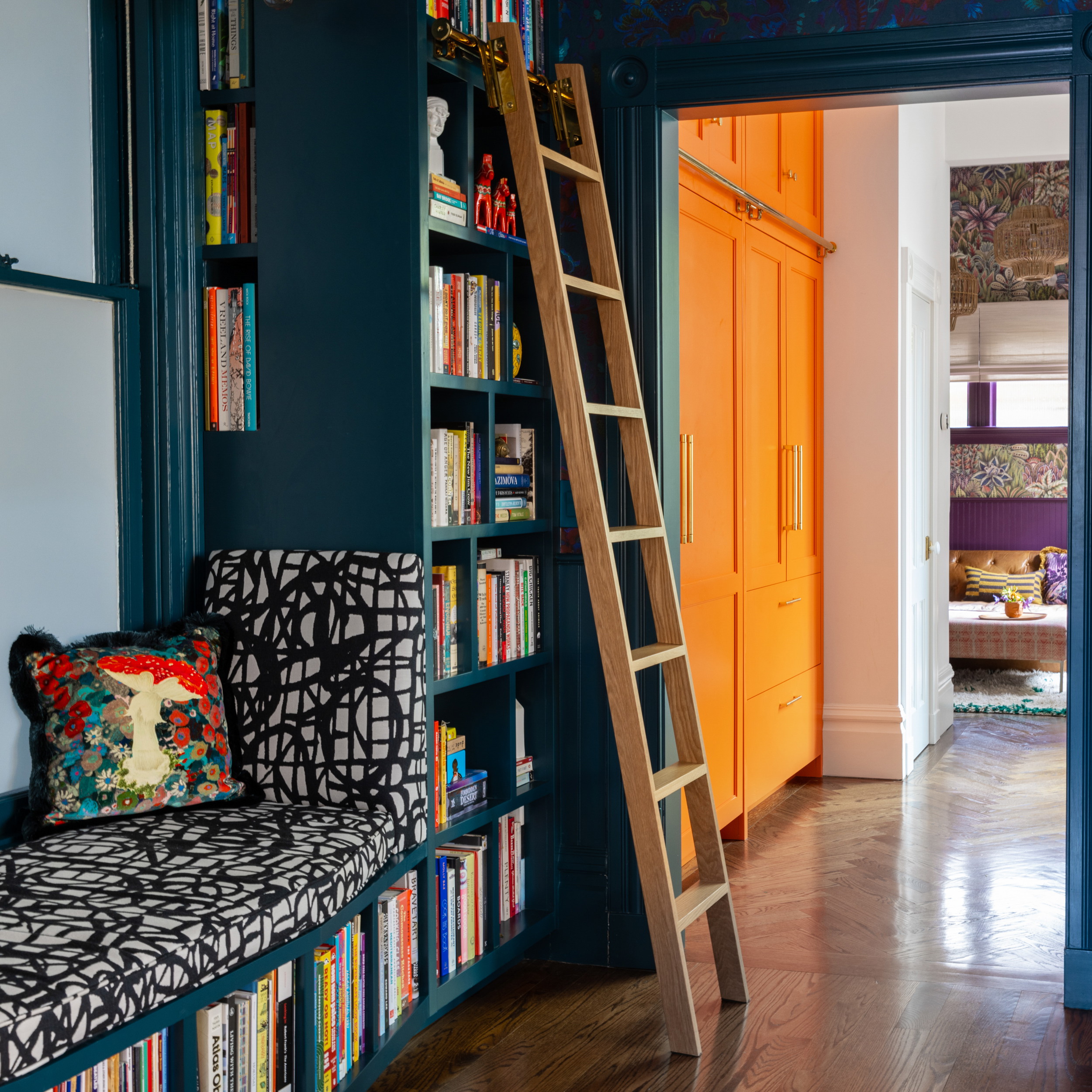 a ladder leaning up against a bookshelf in a living room