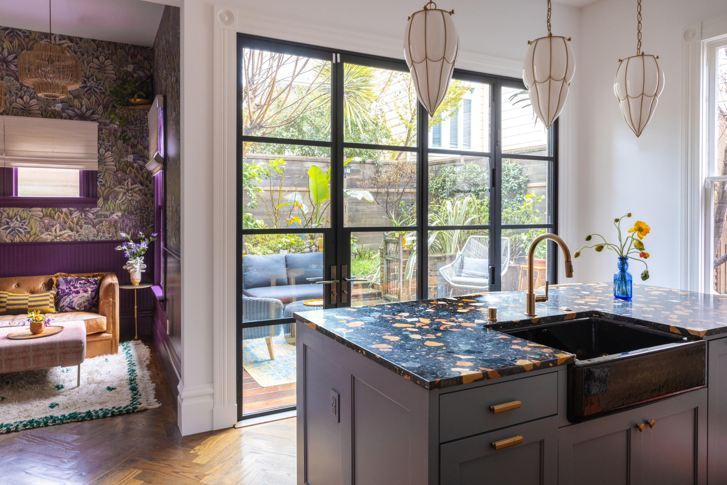 a kitchen with a sink and a large window