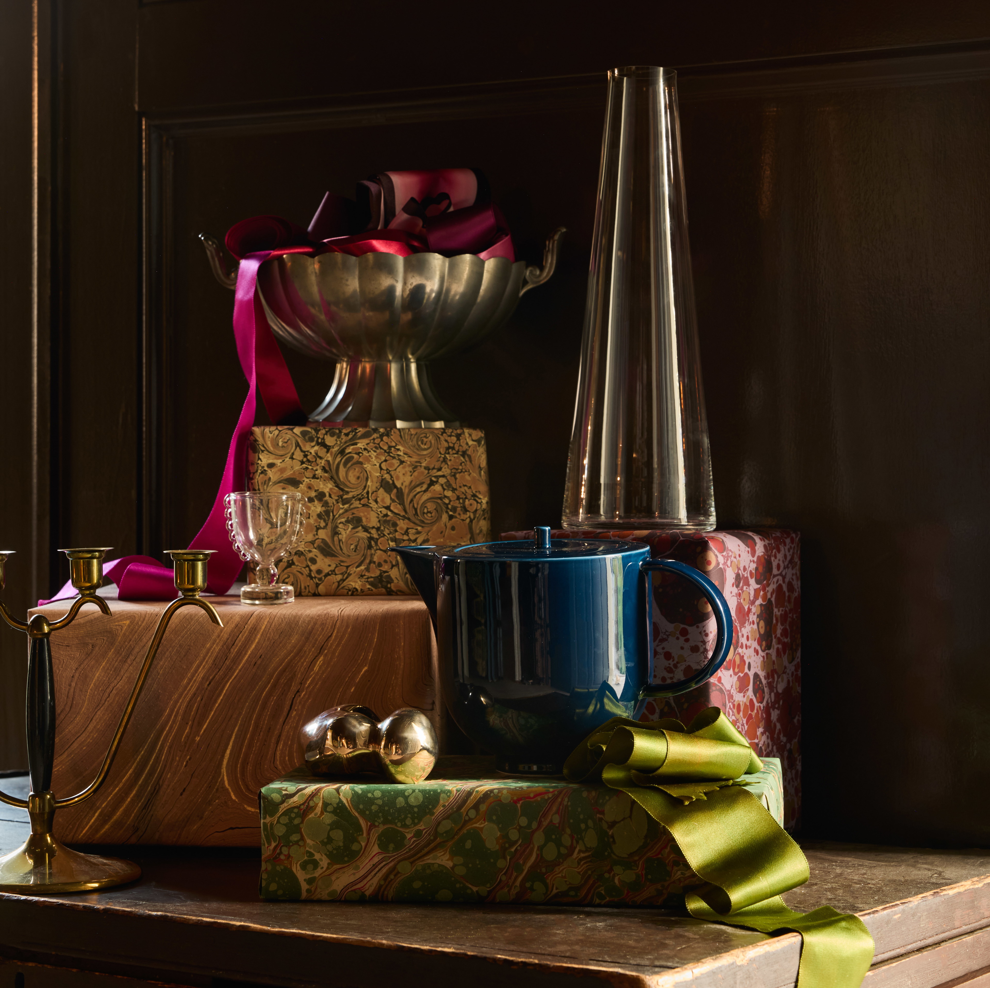 a wooden table topped with lots of different types of items