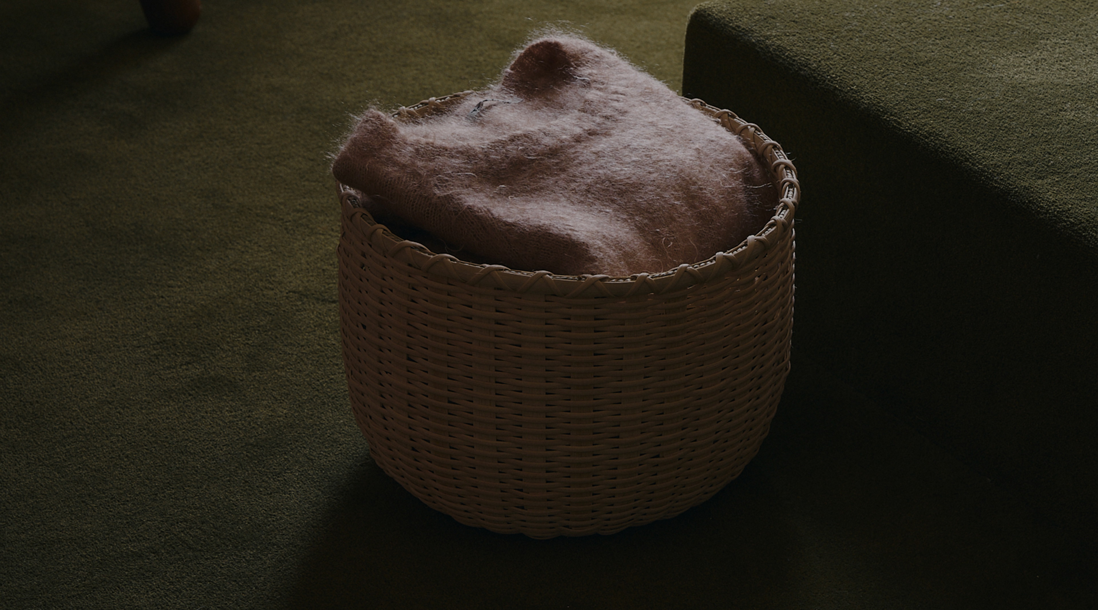 a basket that is sitting on the ground