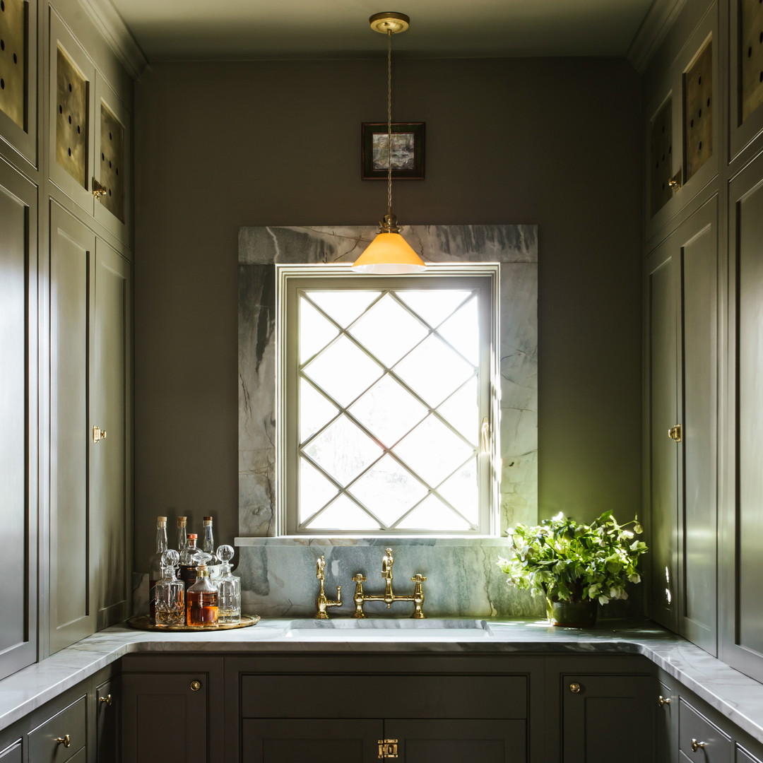 a kitchen with a sink and a window