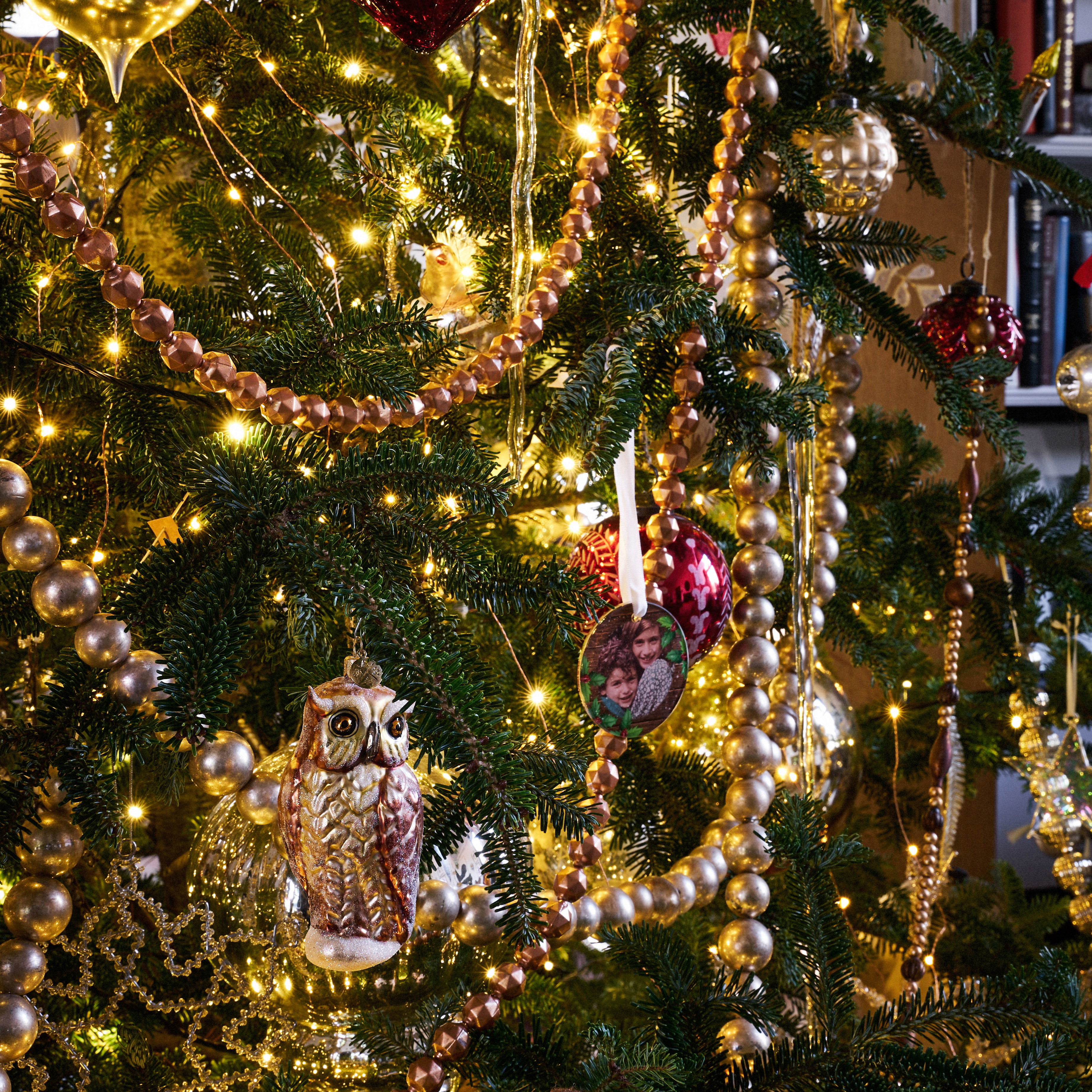 a christmas tree decorated with ornaments and lights