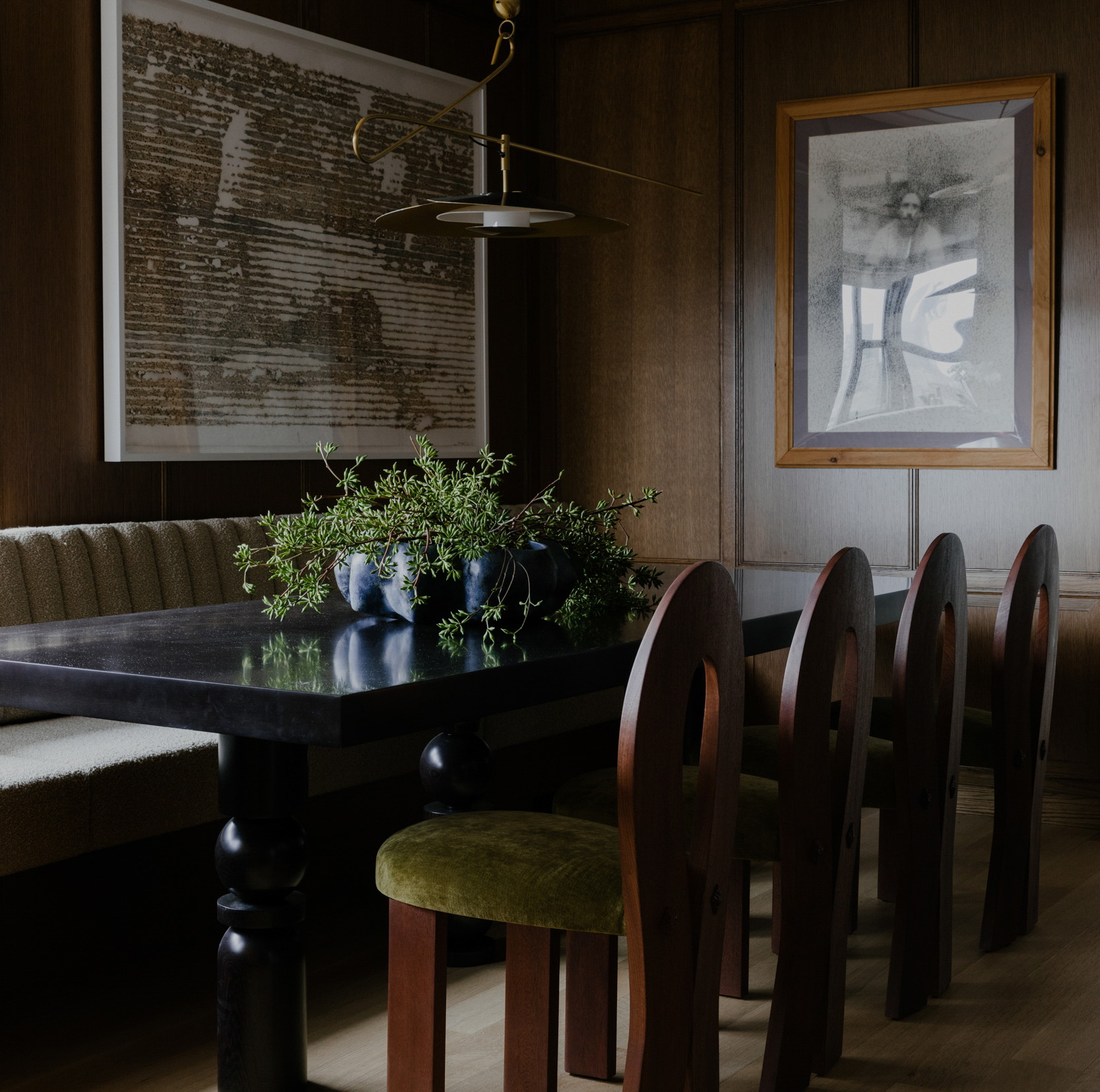 a dining room with a table and chairs