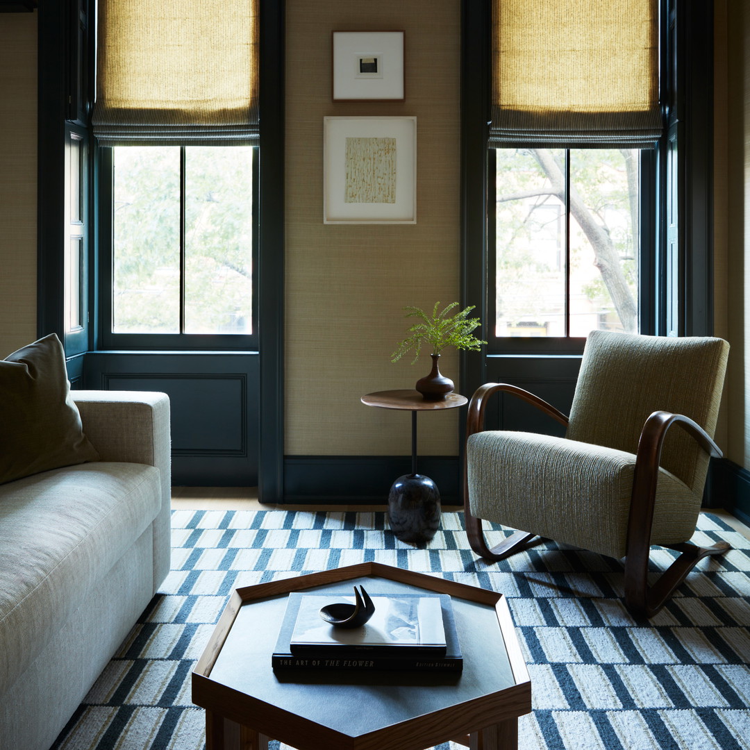 a living room with two couches and a coffee table