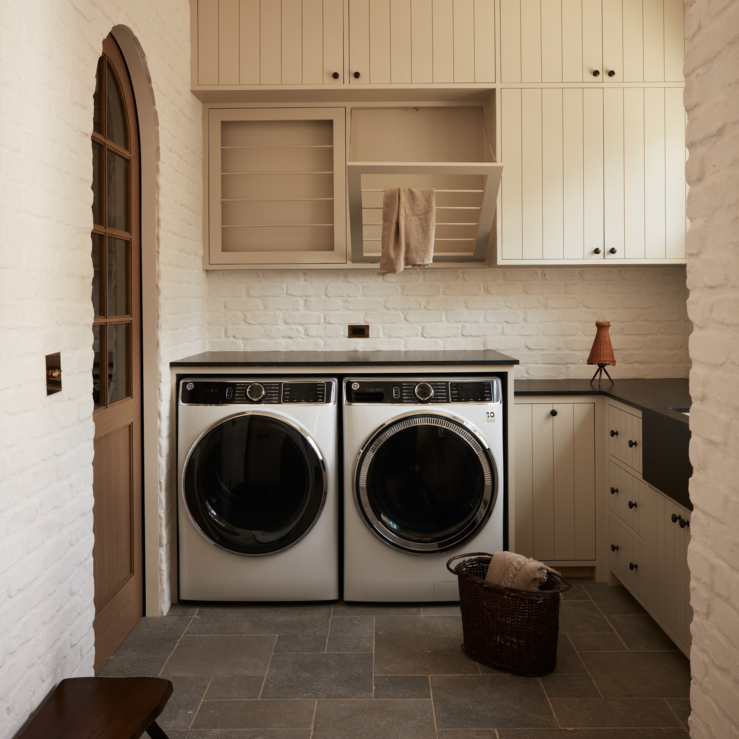 a laundry room with a washer and dryer