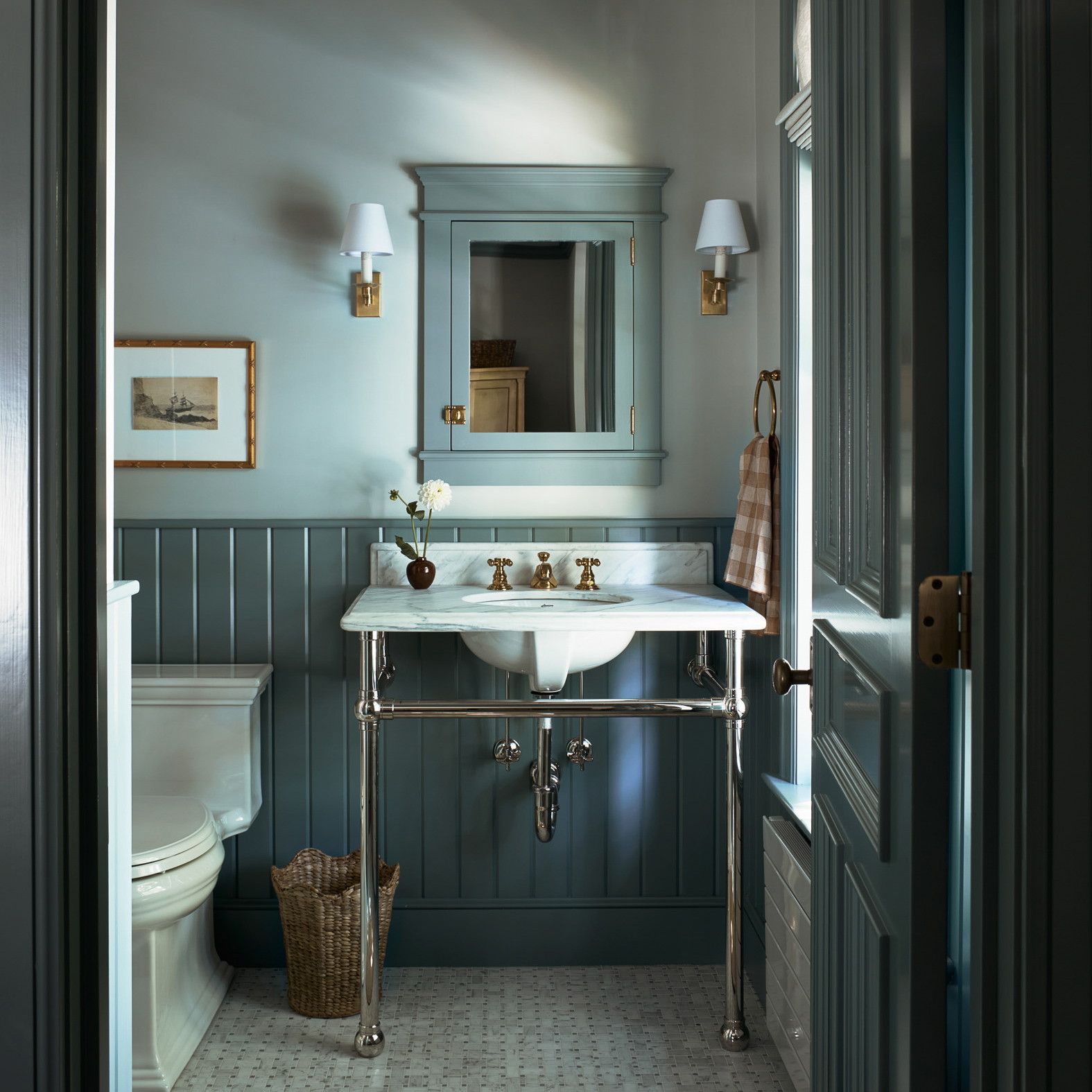 a bathroom with a sink and a toilet