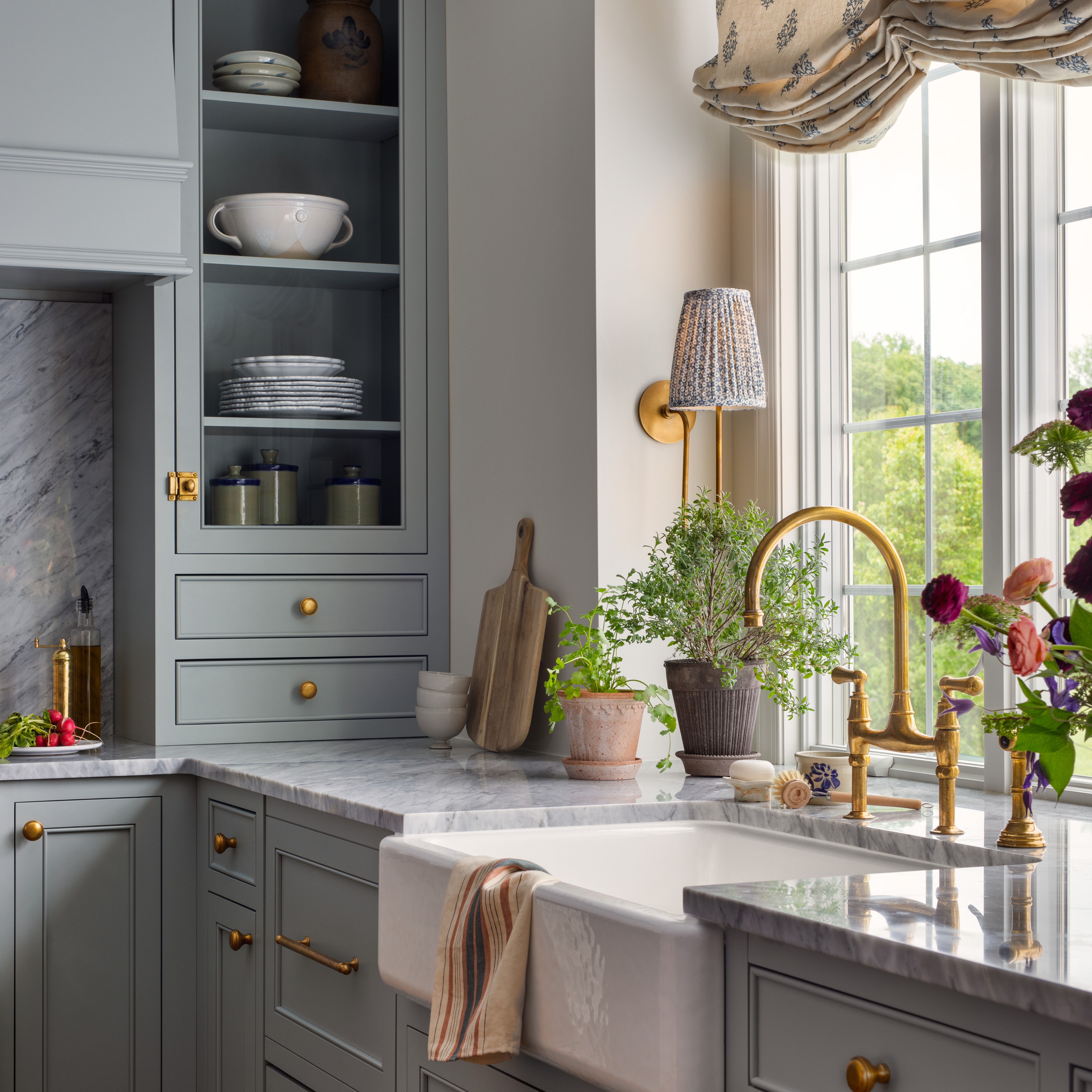 a kitchen with a sink and a window