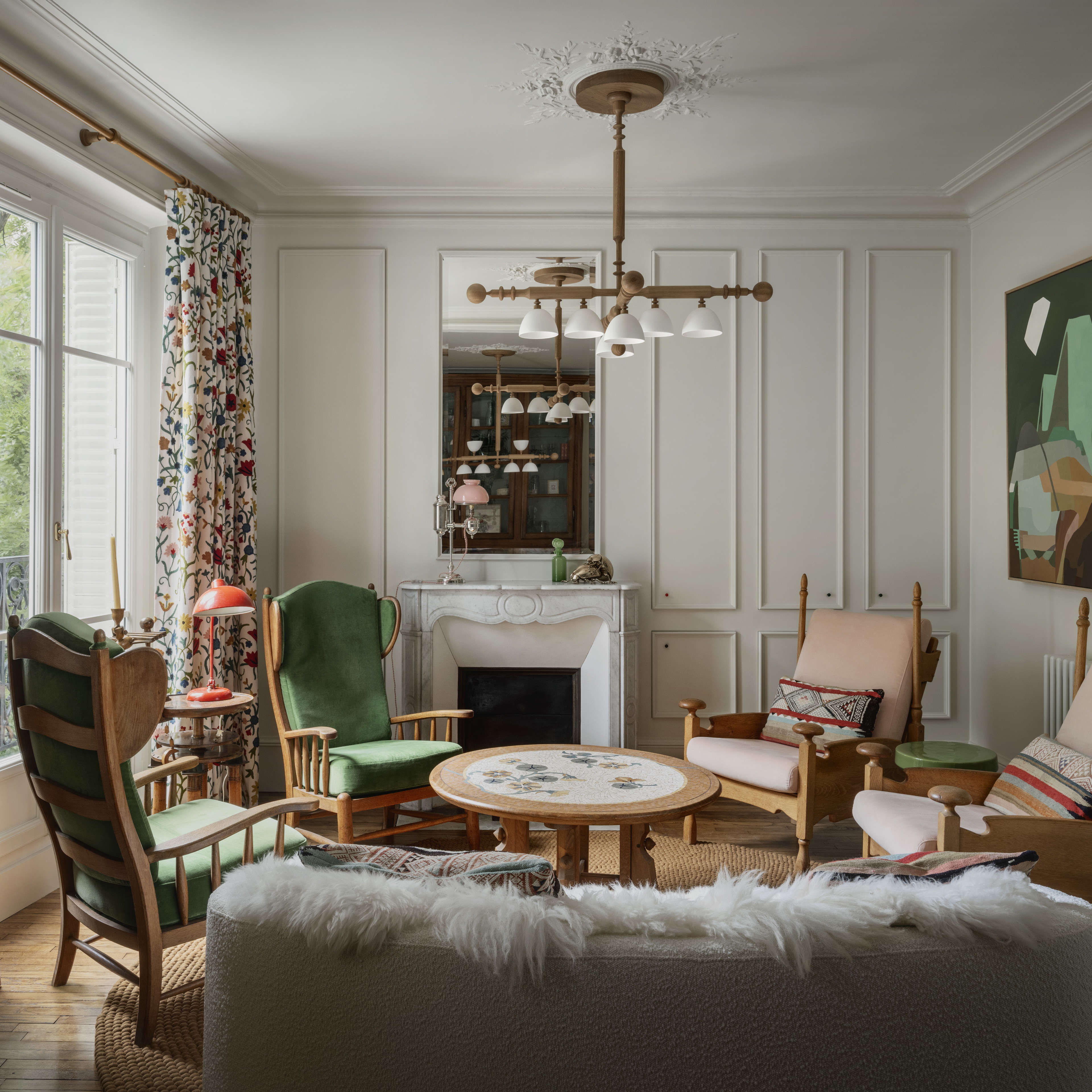 a living room filled with furniture and a fire place