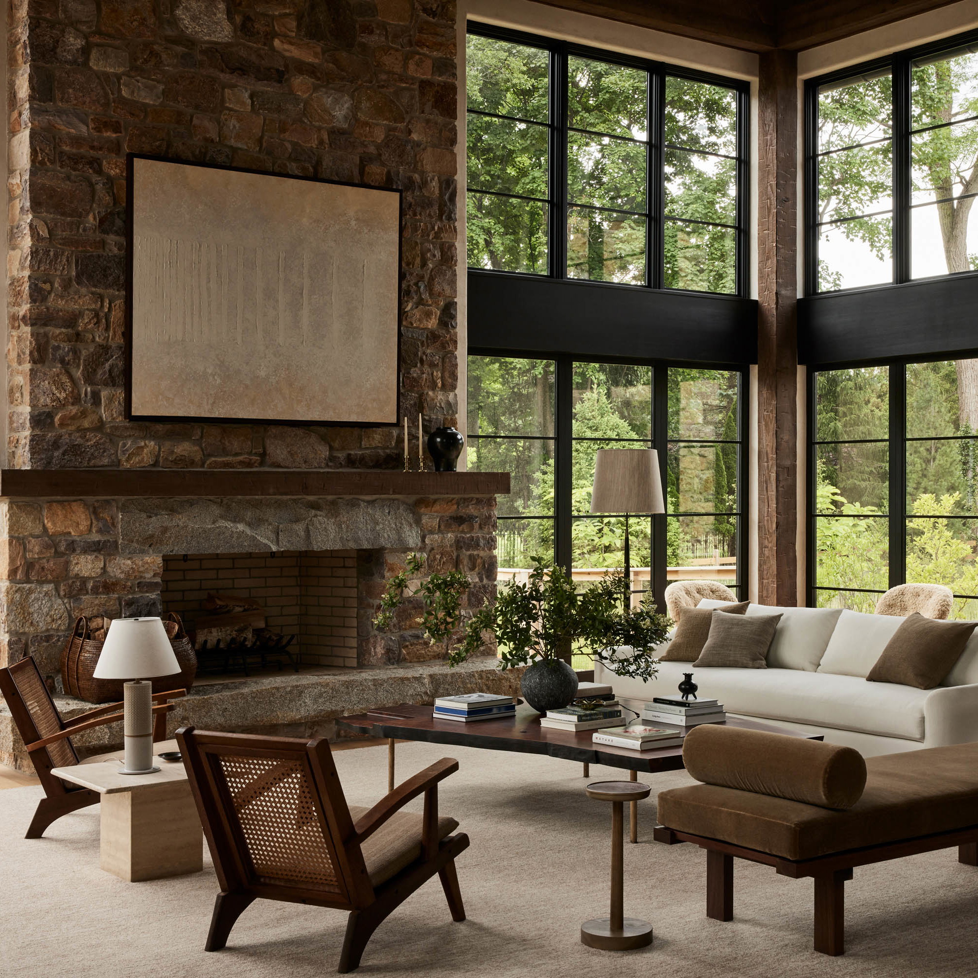 a living room filled with furniture and a fire place