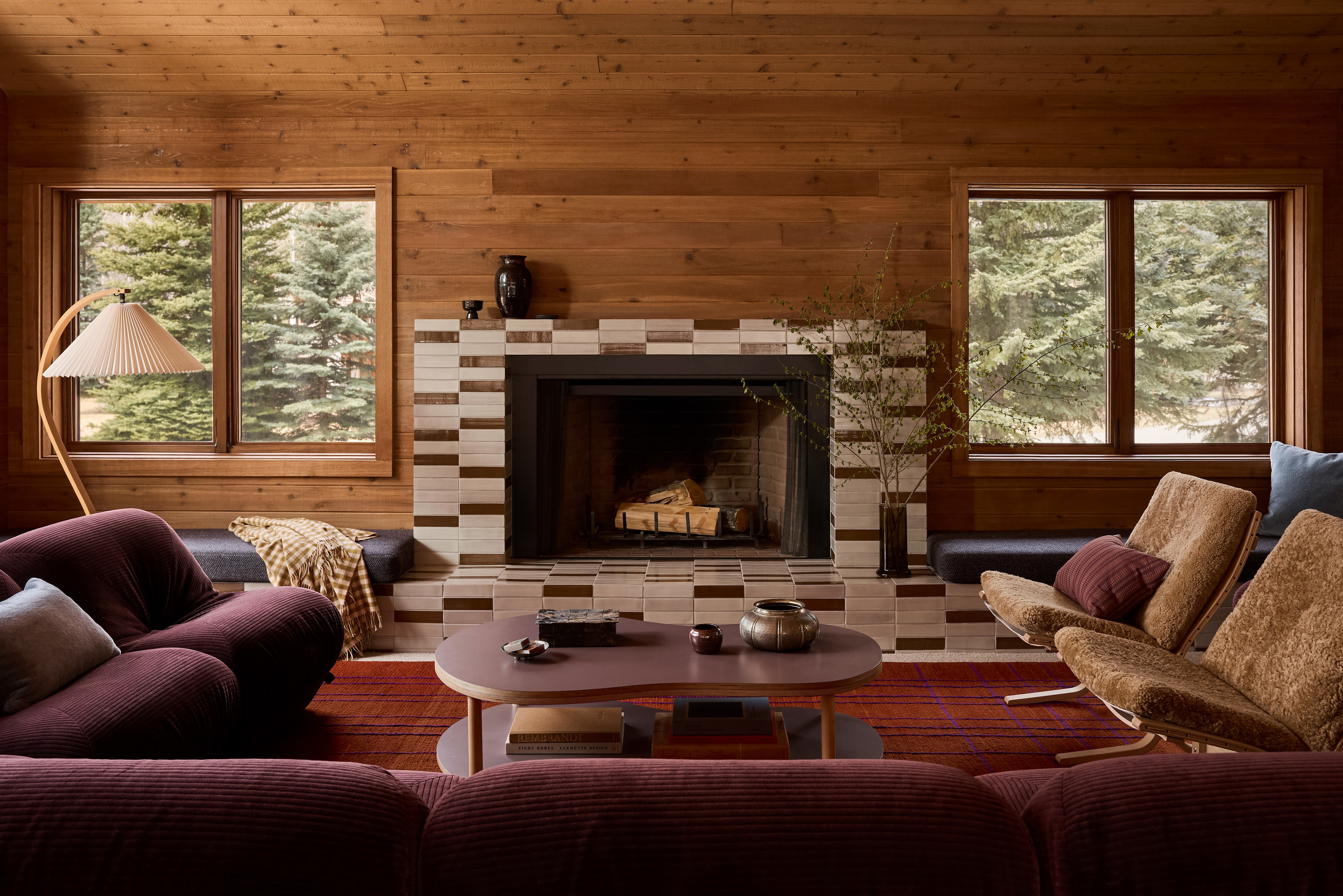 a living room filled with furniture and a fire place