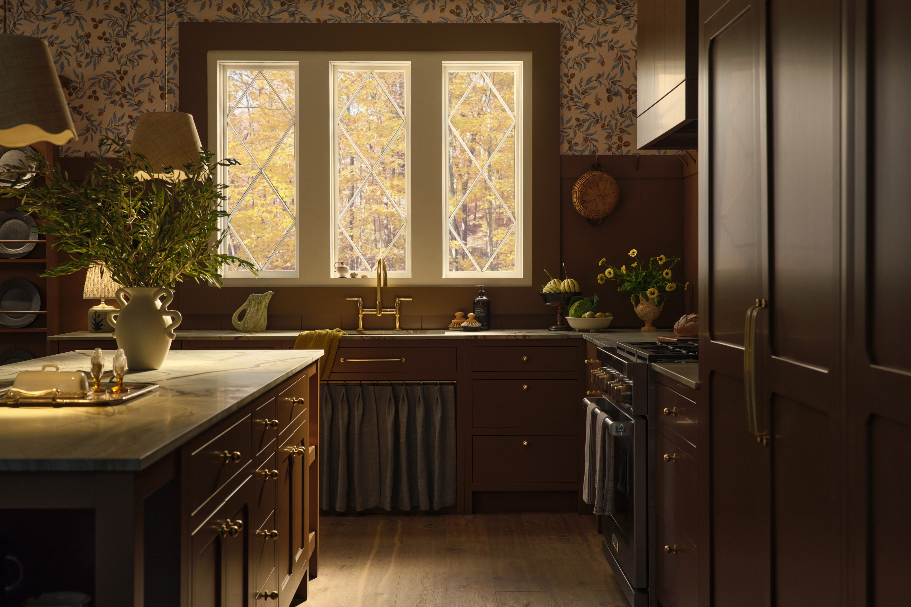 a kitchen with a sink, stove and a window