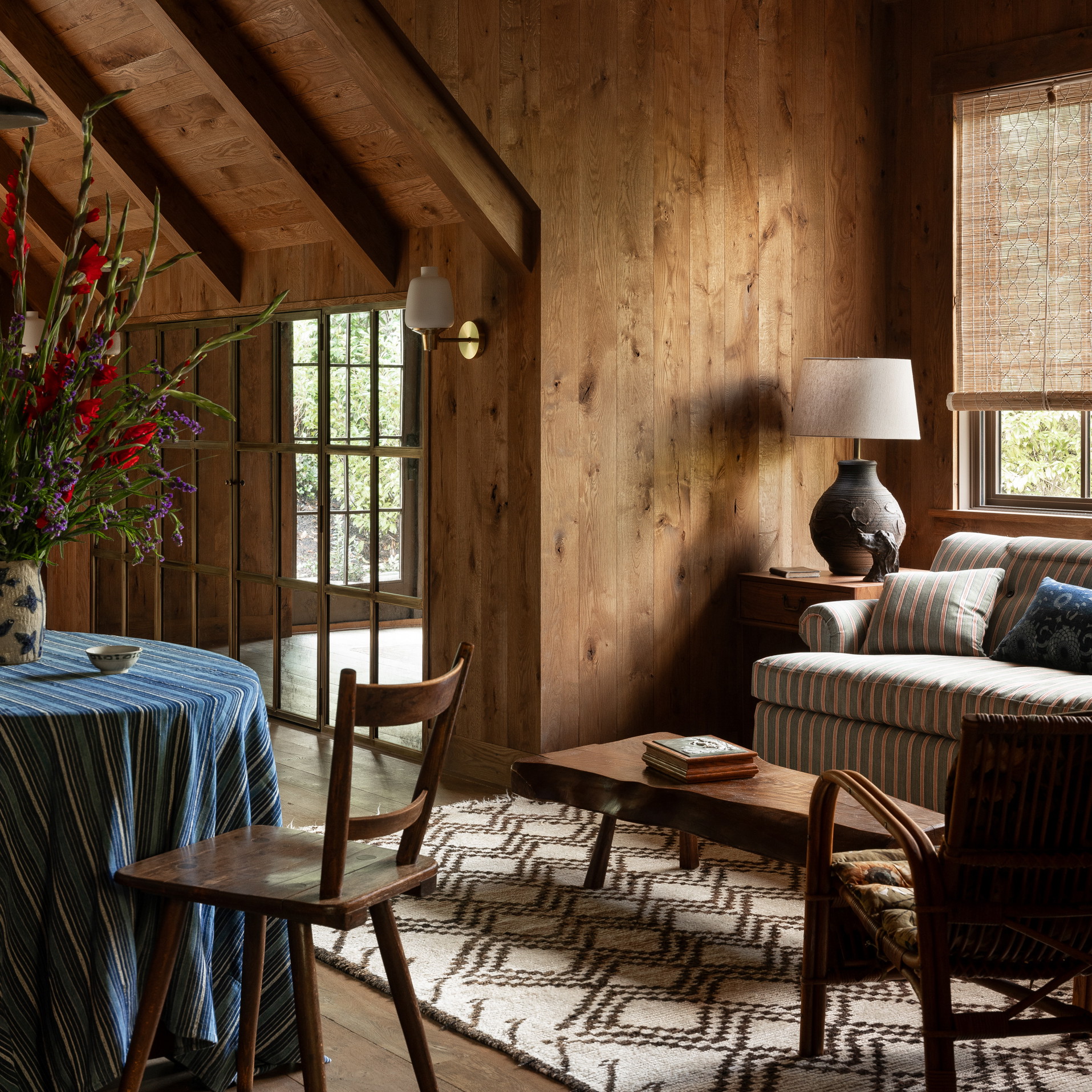 a living room filled with furniture and a table