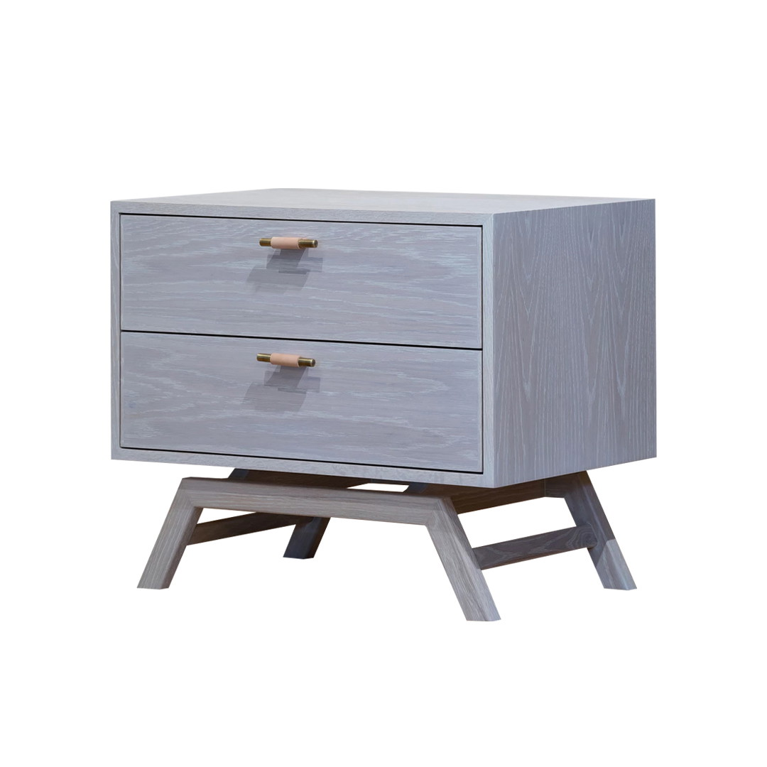 a wooden nightstand with two drawers on top of it