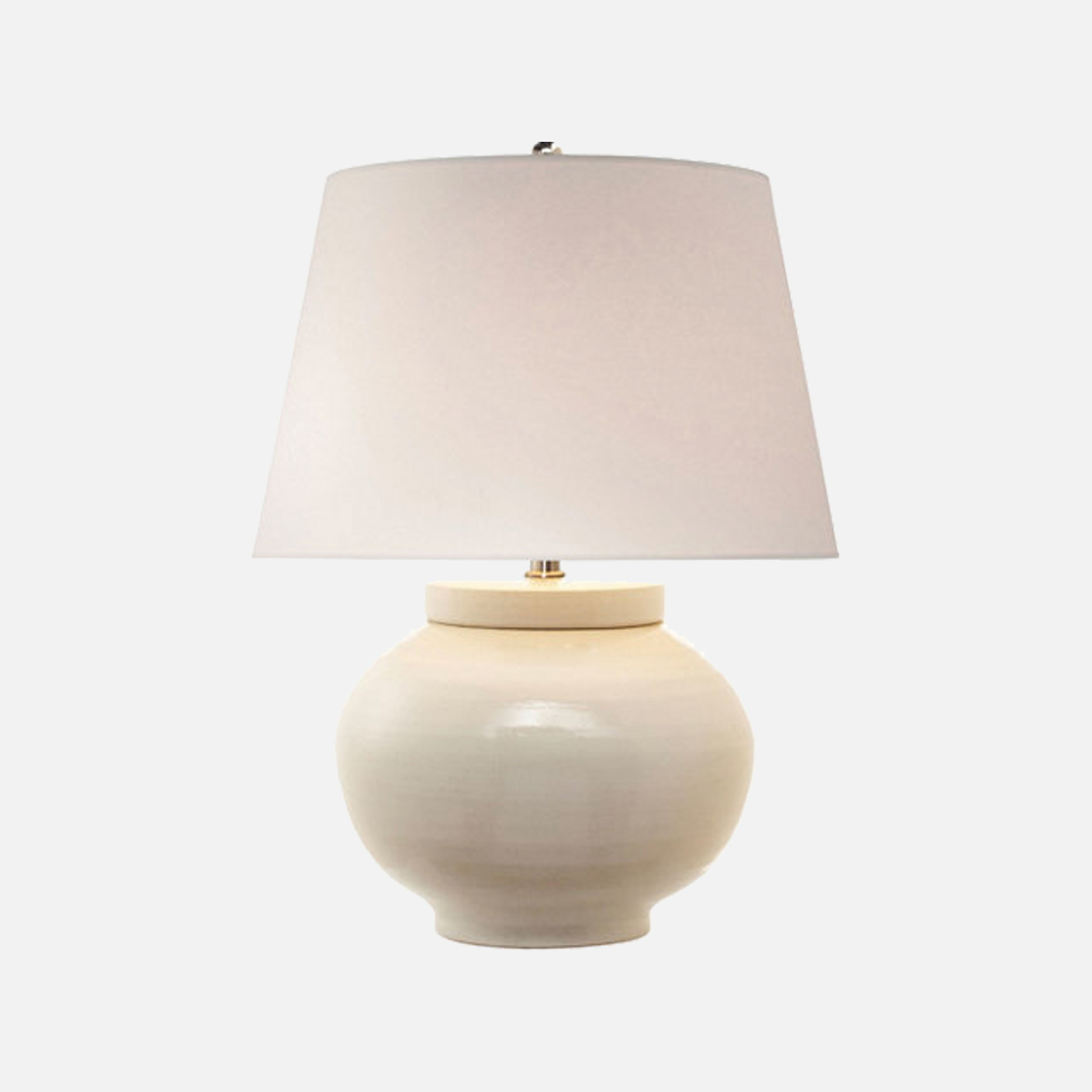 a white table lamp with a white shade