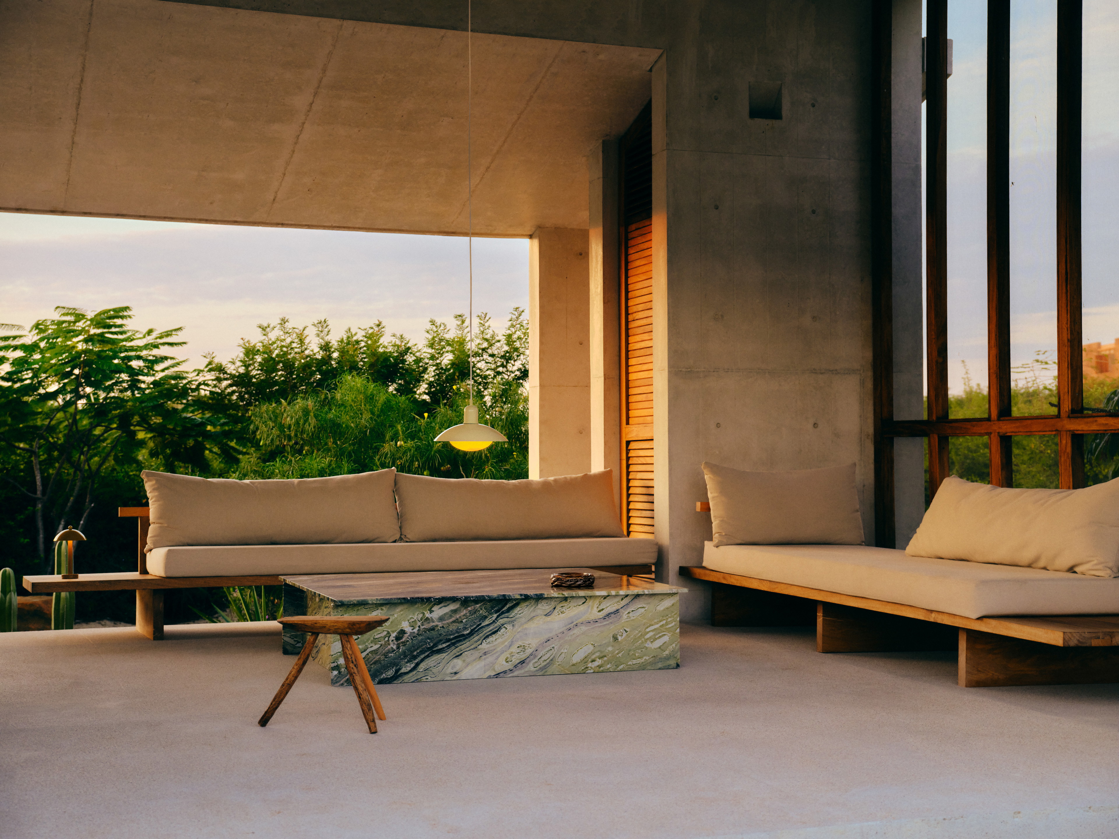 a living room with couches and a coffee table
