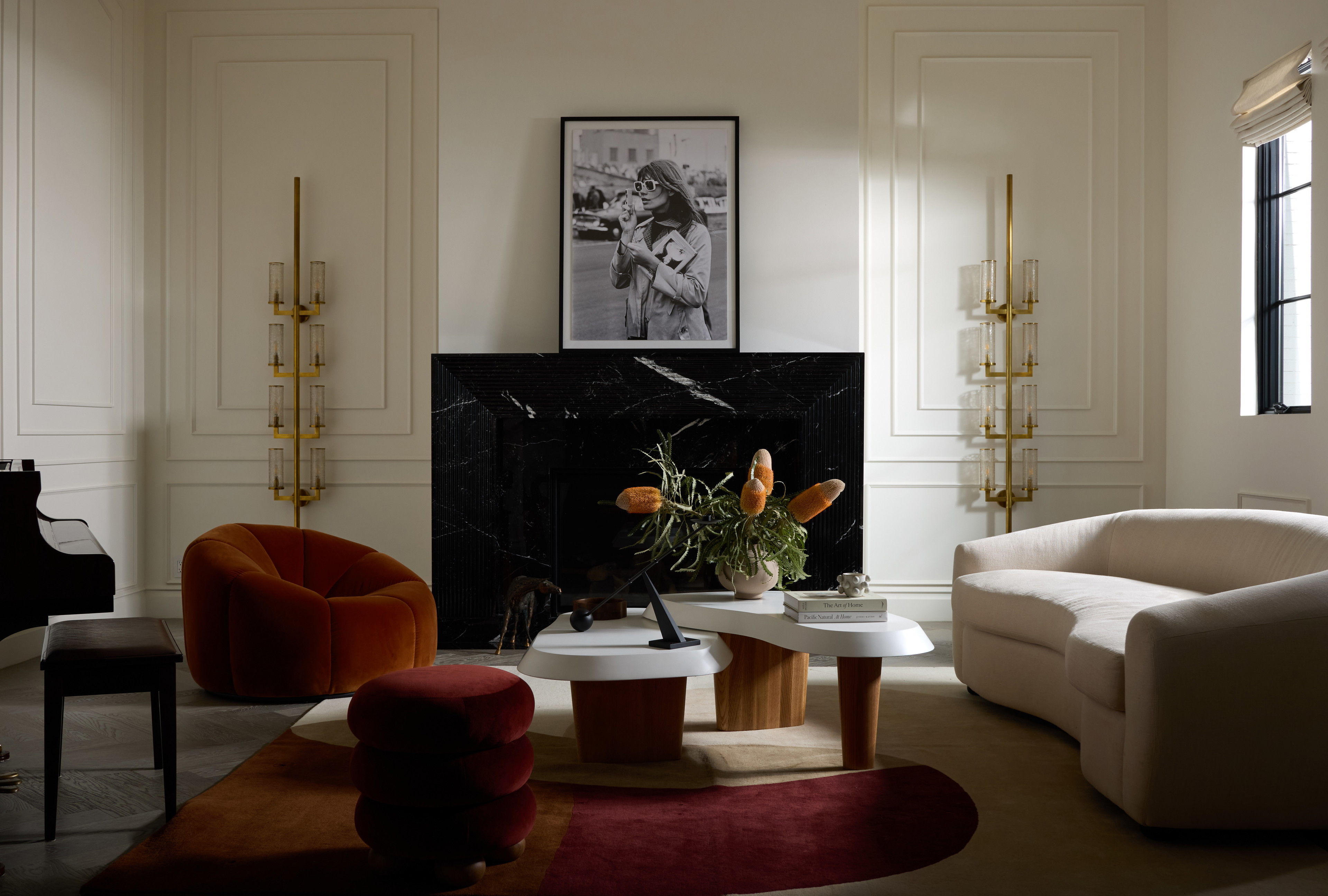 a living room filled with furniture and a fire place