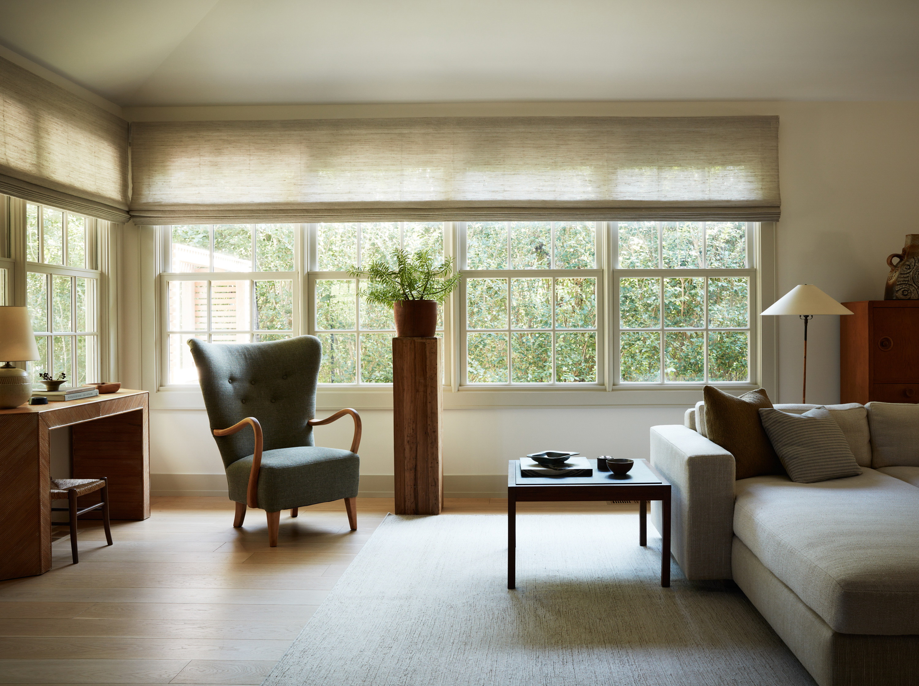 a living room with a couch and a chair