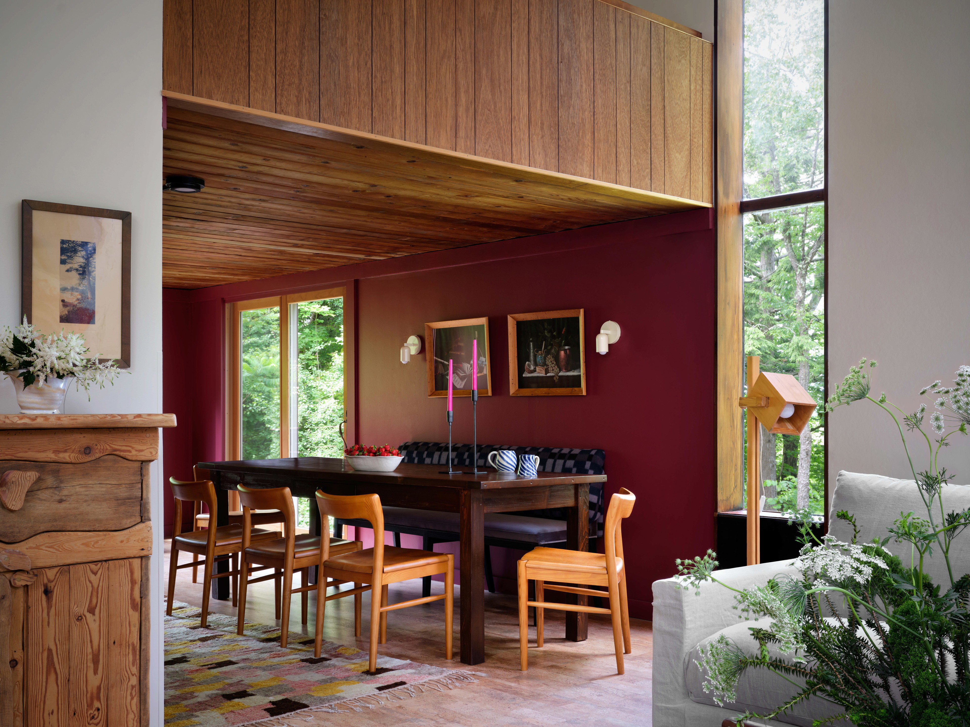 a dining room with a table and chairs