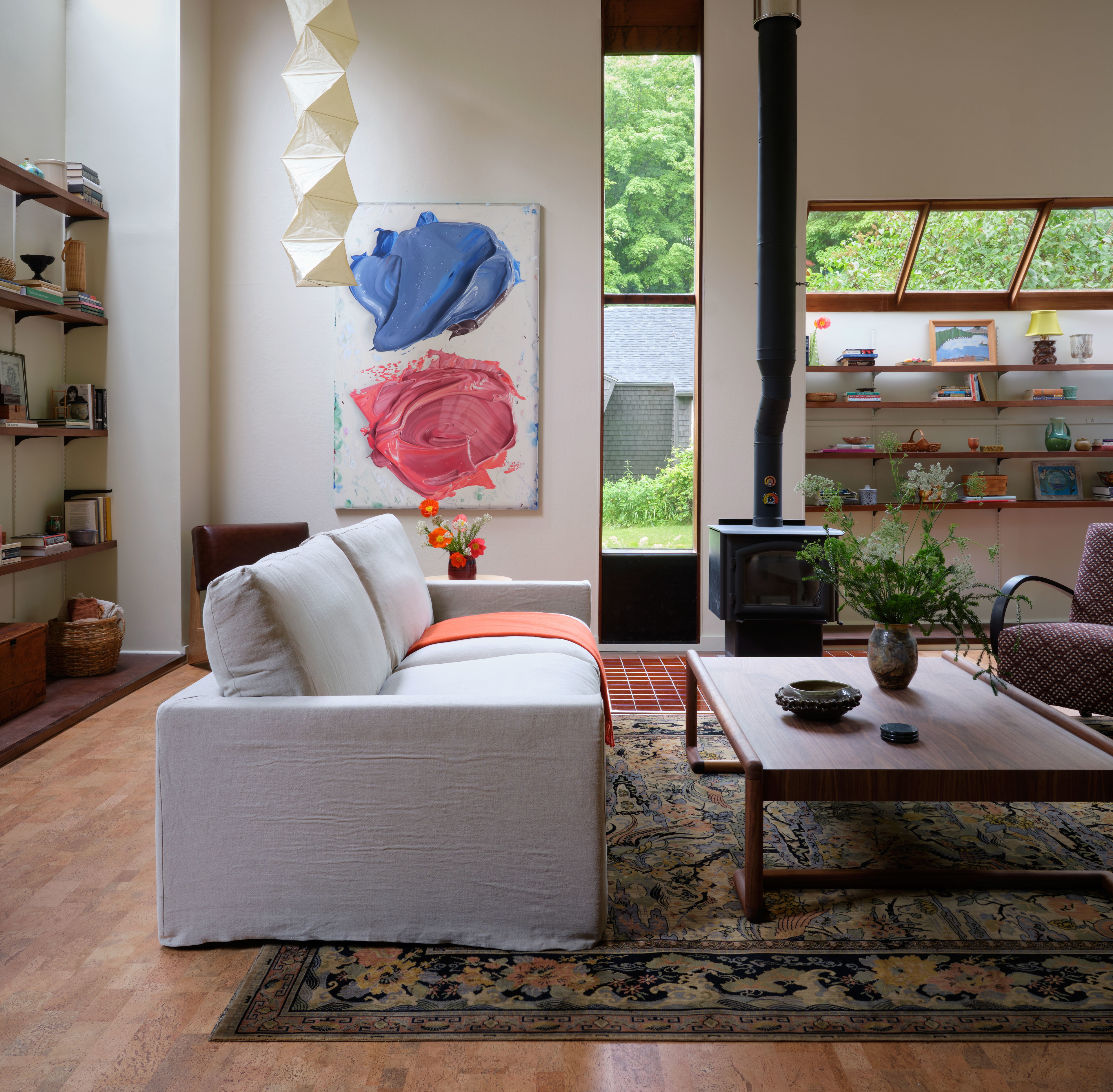 a living room filled with furniture and a fire place