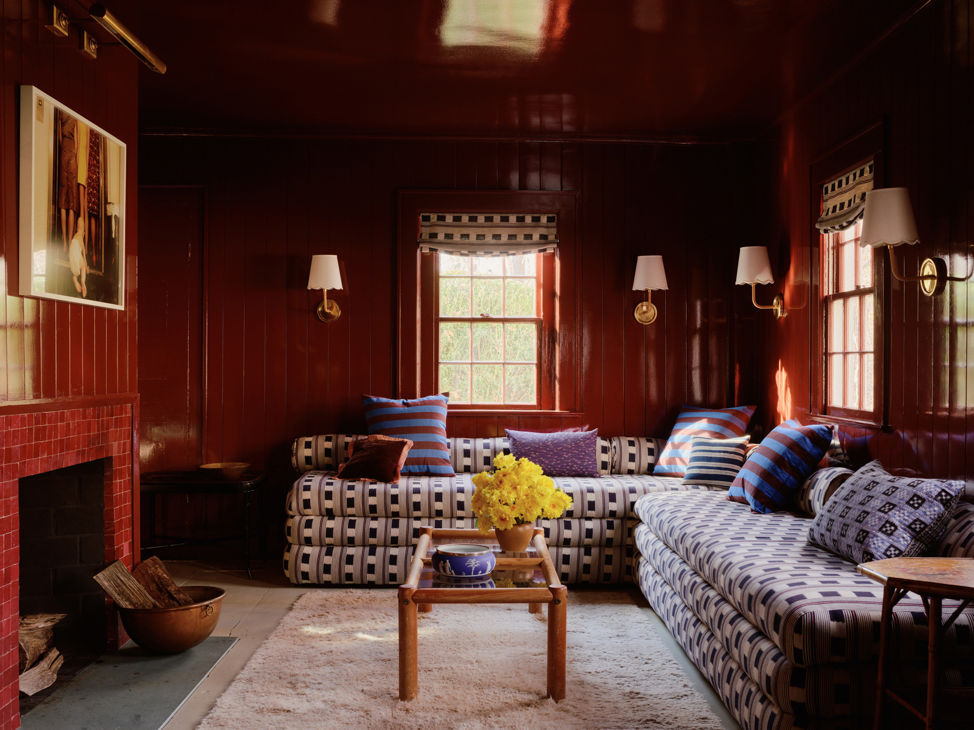 a living room filled with furniture and a fire place