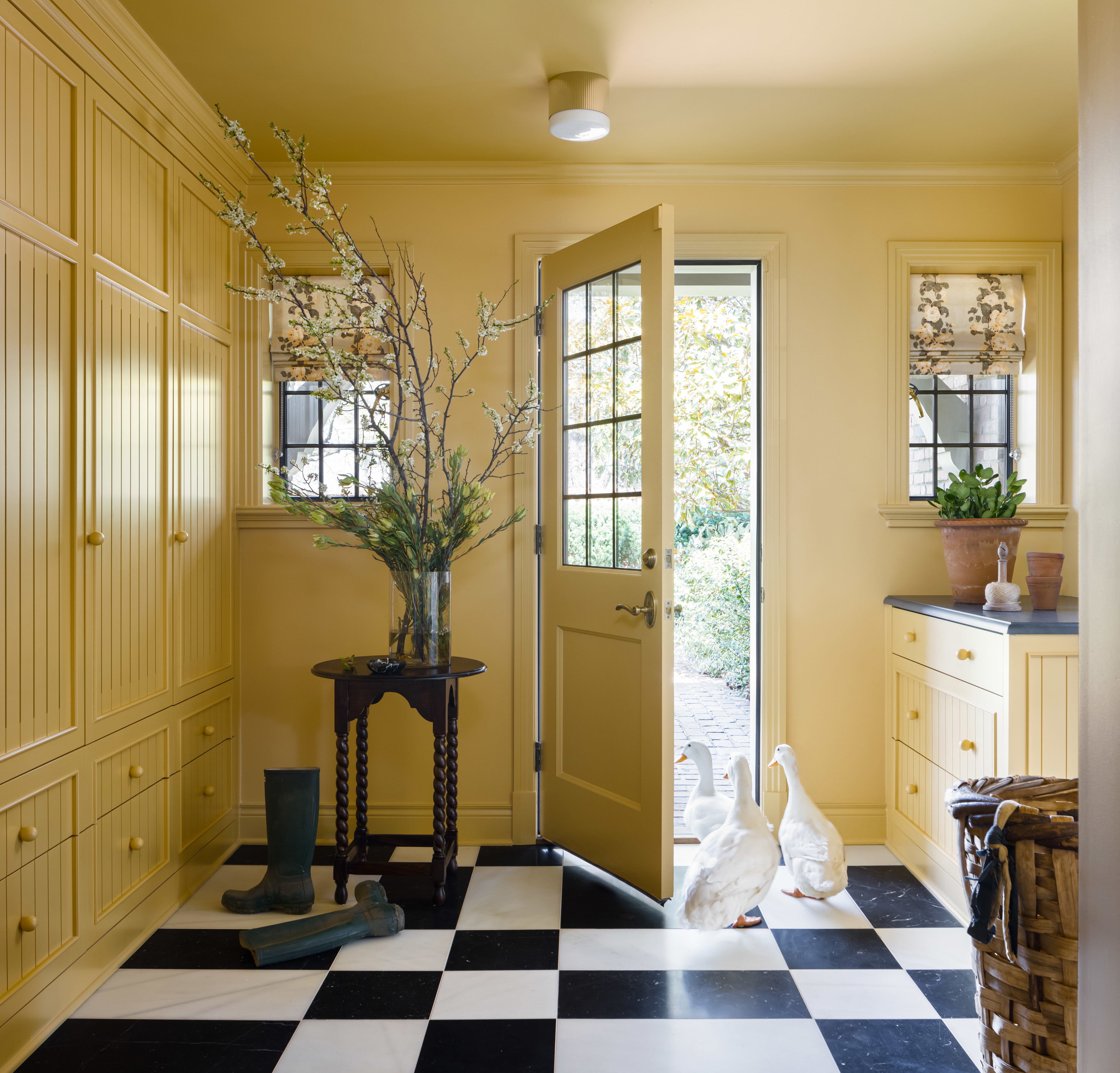 a black and white checkered floor in a kitchen